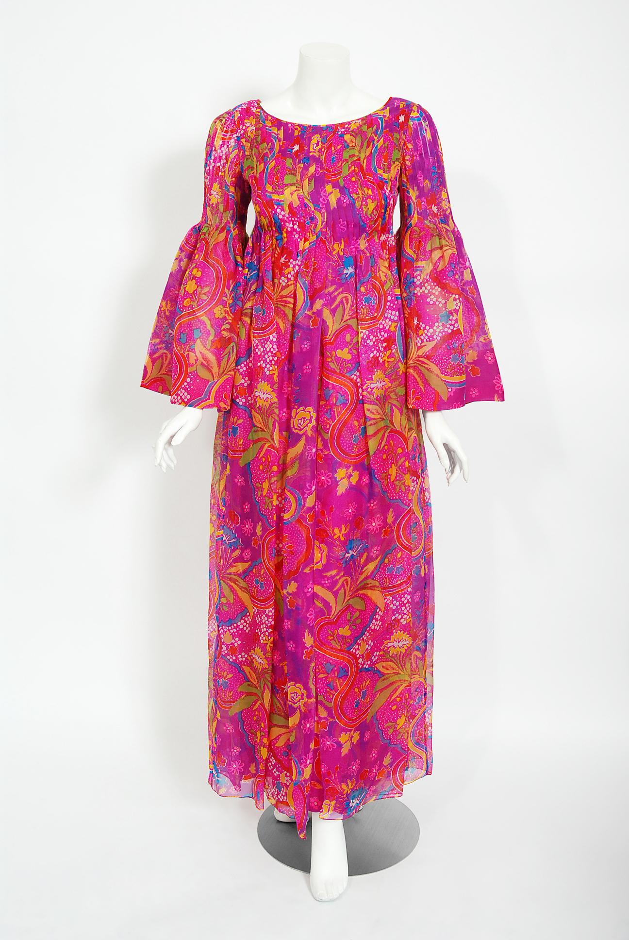 Spectacular Pierre Cardin psychedelic fantasy floral print silk organza maxi dress from his 1969 spring-summer collection. In 1951 Cardin opened his own couture house and by 1957, he started a ready-to-wear line; a bold move for a French couturier