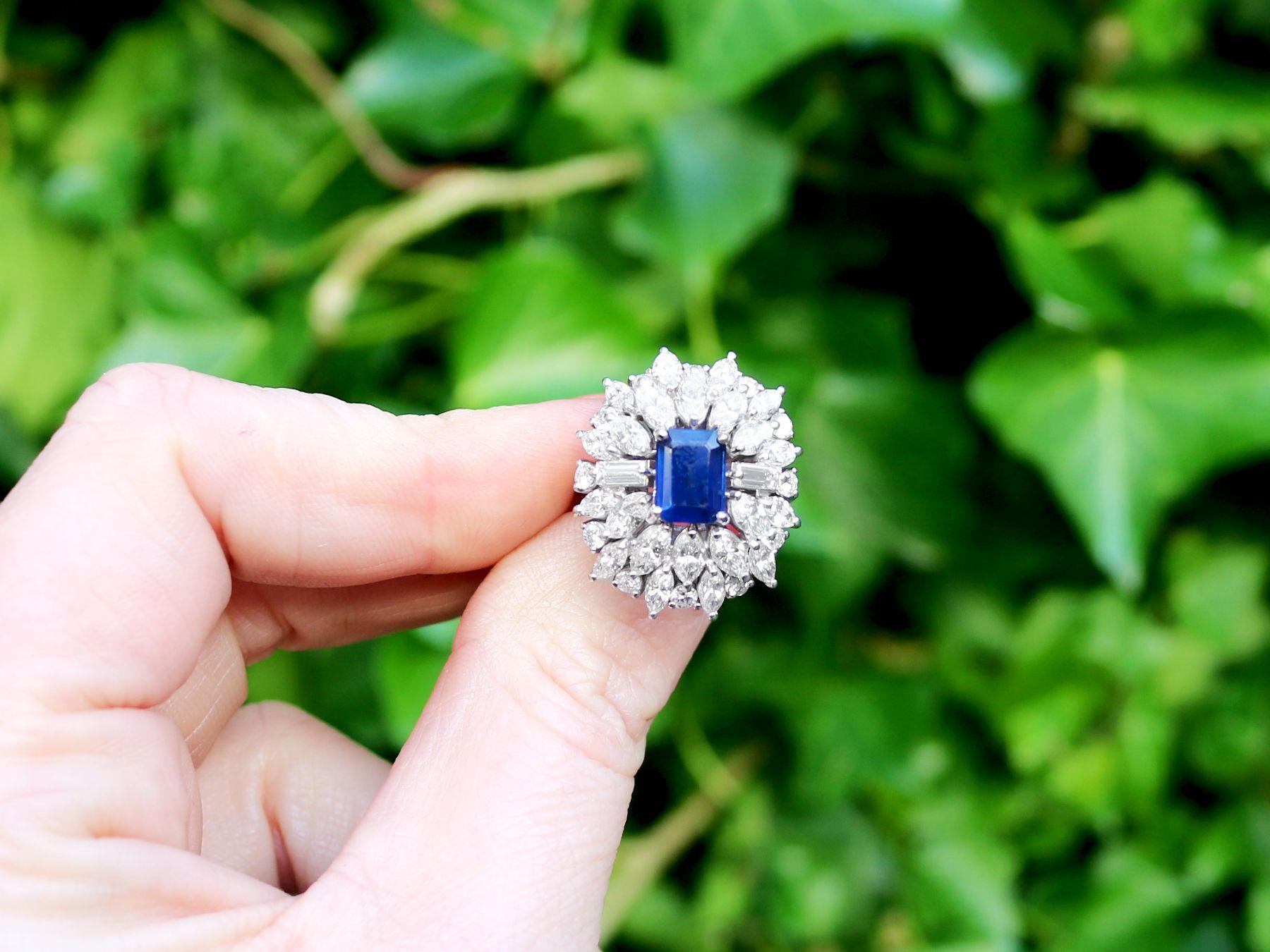 A stunning and impressive vintage 1.97 carat sapphire and 4.05 carat diamond, 15 karat white gold dress ring; part of our diverse antique estate jewelry collections

This stunning, fine and impressive sapphire and diamond ring has been crafted in