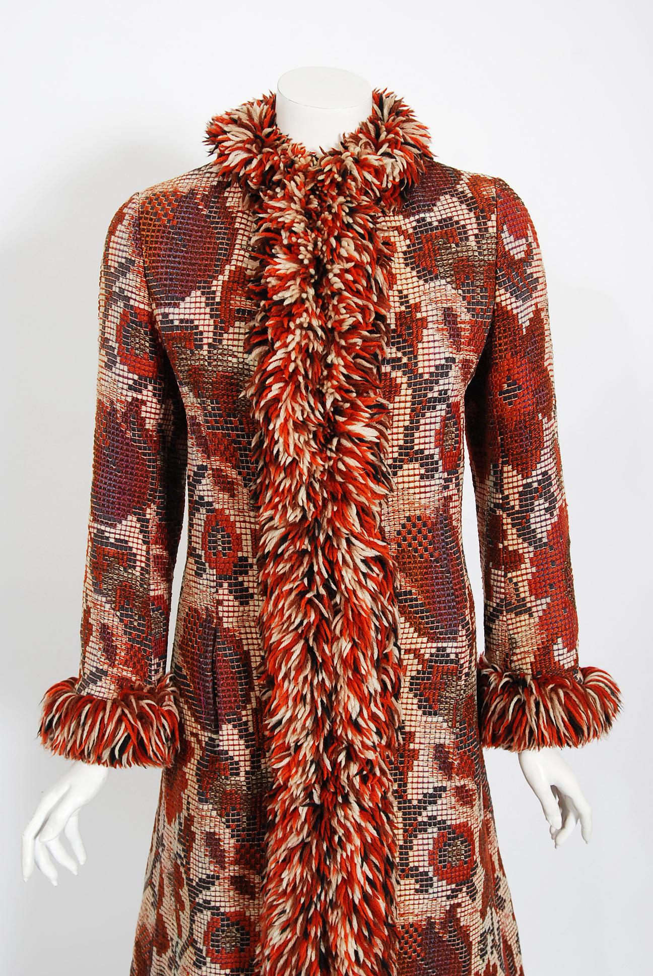 Gorgeous Anne Klein floral wool tapestry coat dating back to her 1970 collection. Anne formed Anne Klein and Company in 1968 and the lion logo was immediately identified with the brand. In 1970, Saks Fifth Avenue in New York launched the Anne Klein