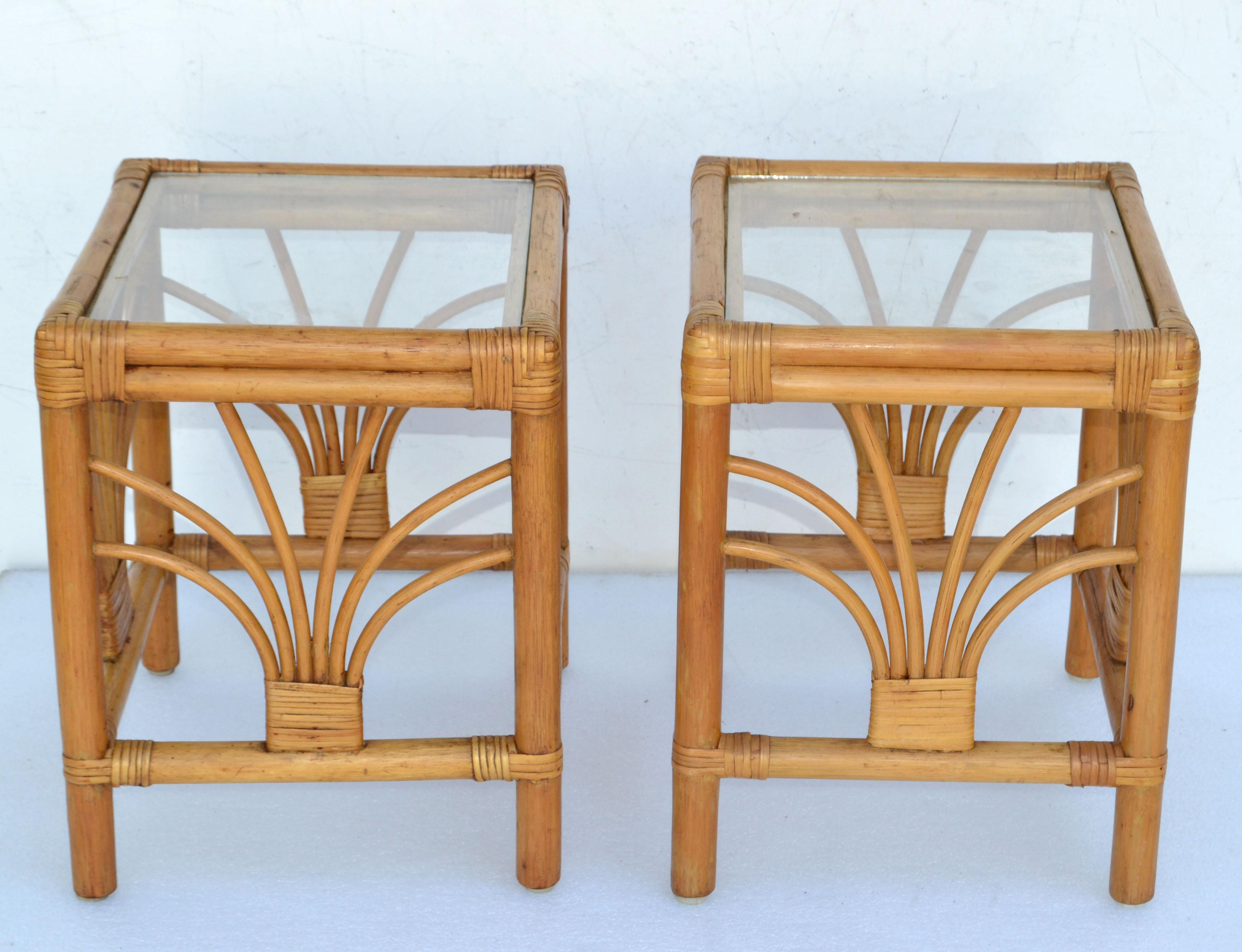 We offer a pair of Vintage handmade bamboo, reed & cane side or end tables with glass tops.
Great for your Florida sun room.
Bohemian Style made in America in the late 1970.
Very good condition and the Glass Tops are newly made.
