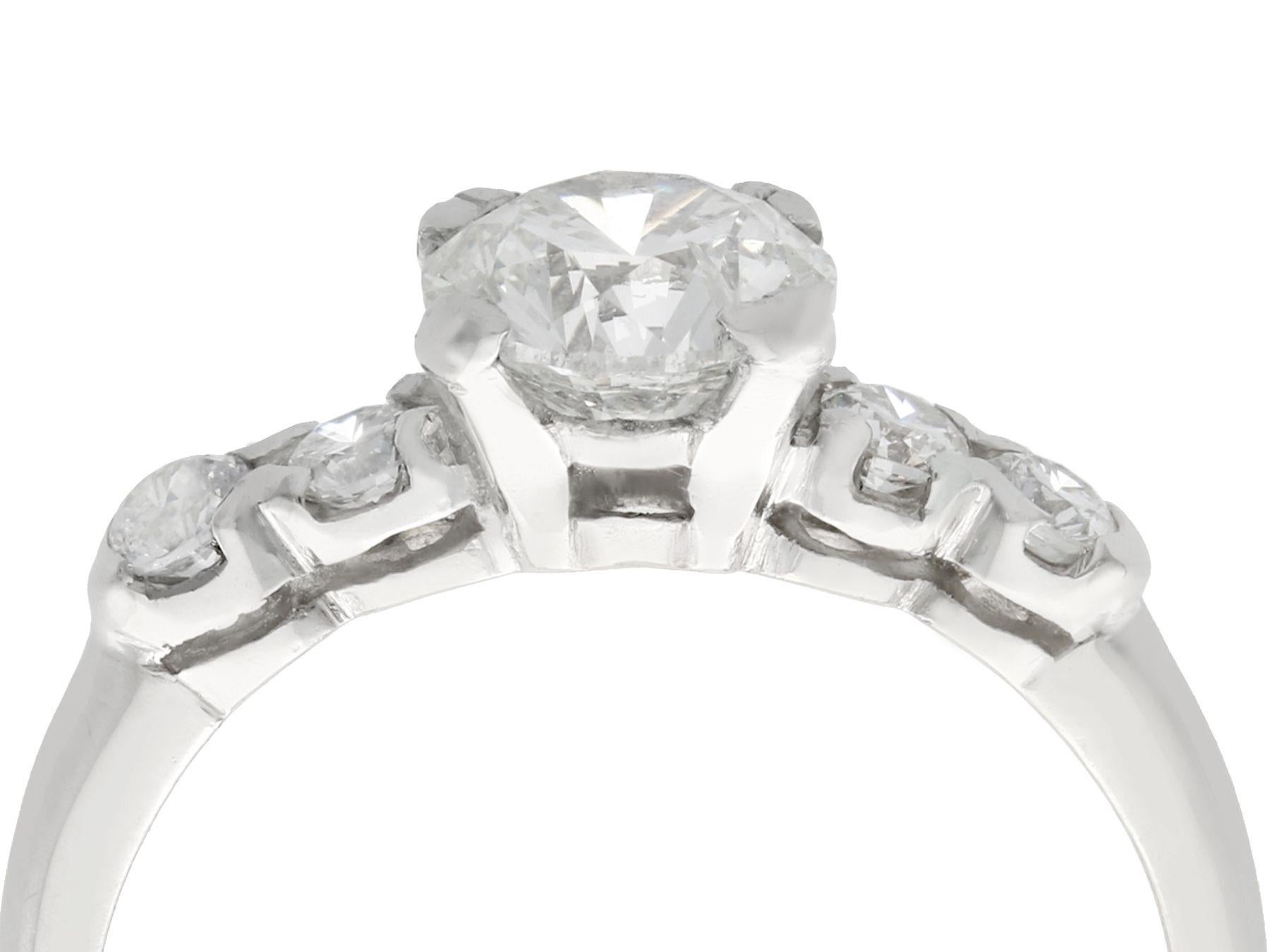 A stunning, fine and impressive vintage 1.21 carat diamond and platinum dress ring; part of our diverse range of engagement rings.

This stunning, fine and impressive vintage diamond and platinum engagement ring has been crafted in platinum.

The