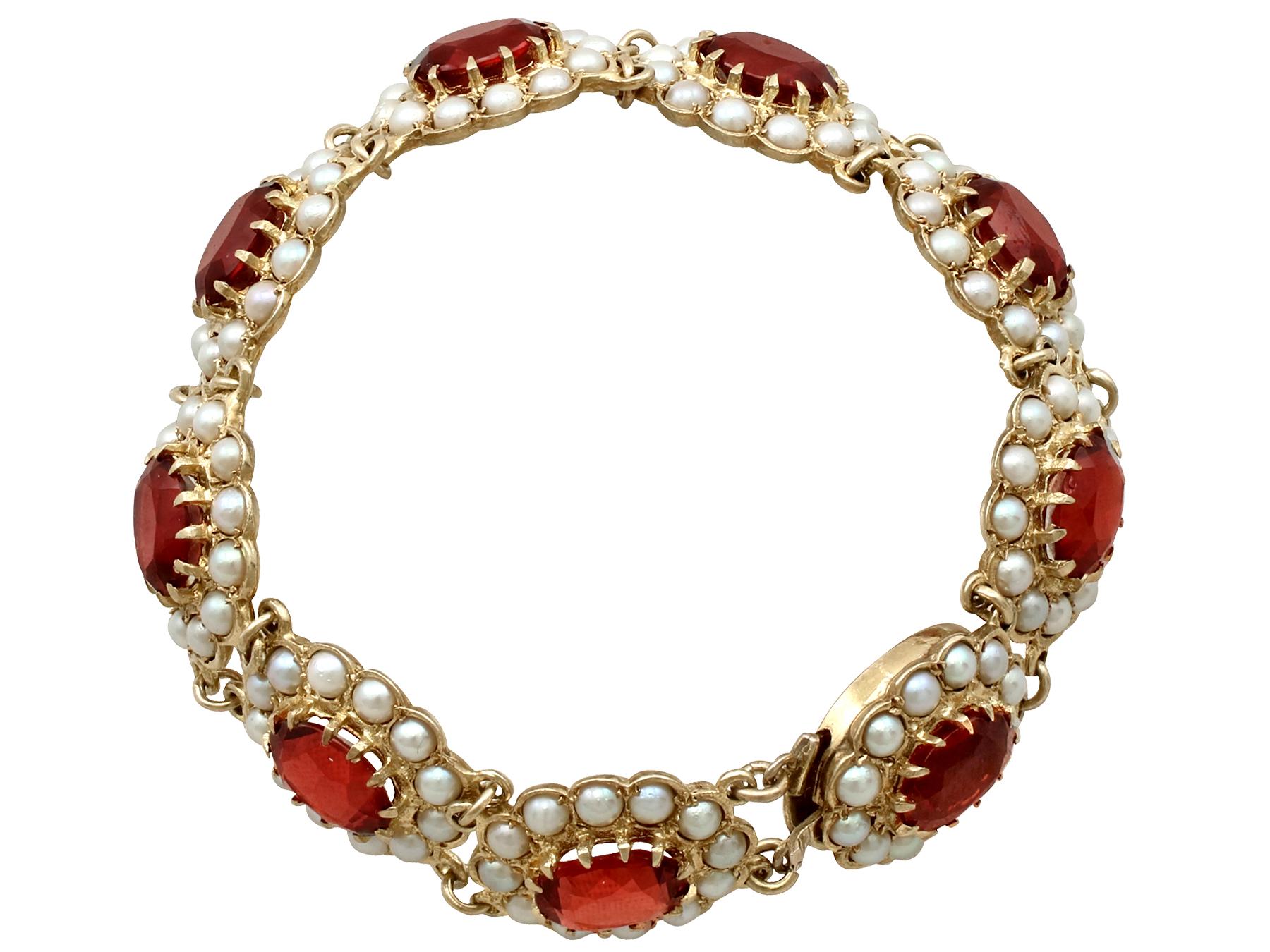 An impressive vintage 13.95 carat almandine garnet and seed pearl, 9 karat yellow gold bracelet; part of our diverse antique jewelry and estate jewelry collections.

This fine and impressive vintage bracelet has been crafted in 9k yellow gold.

The