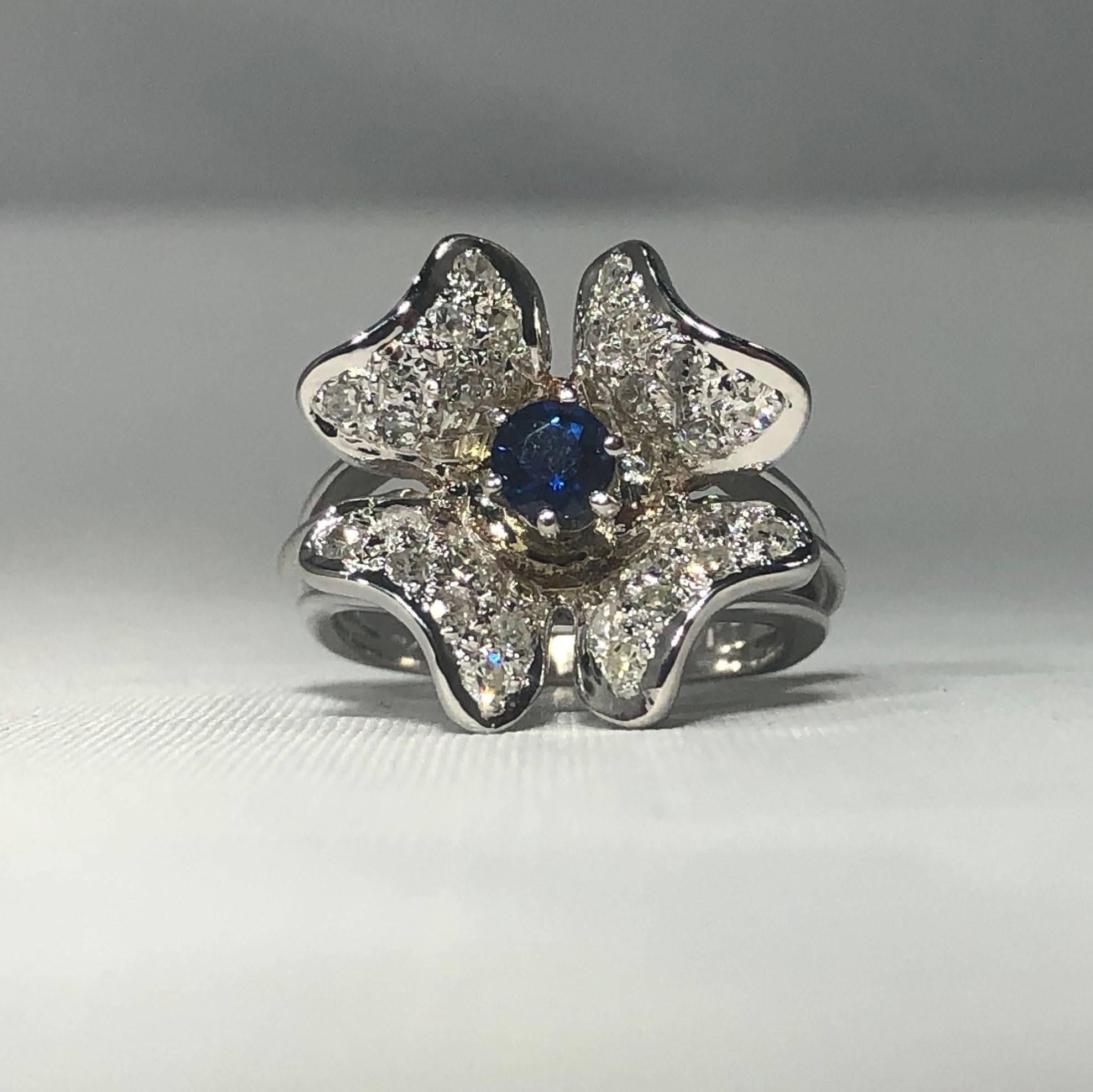 Modern Vintage 1970s 14 Karat Sapphire and Diamond Flower Cocktail Ring For Sale
