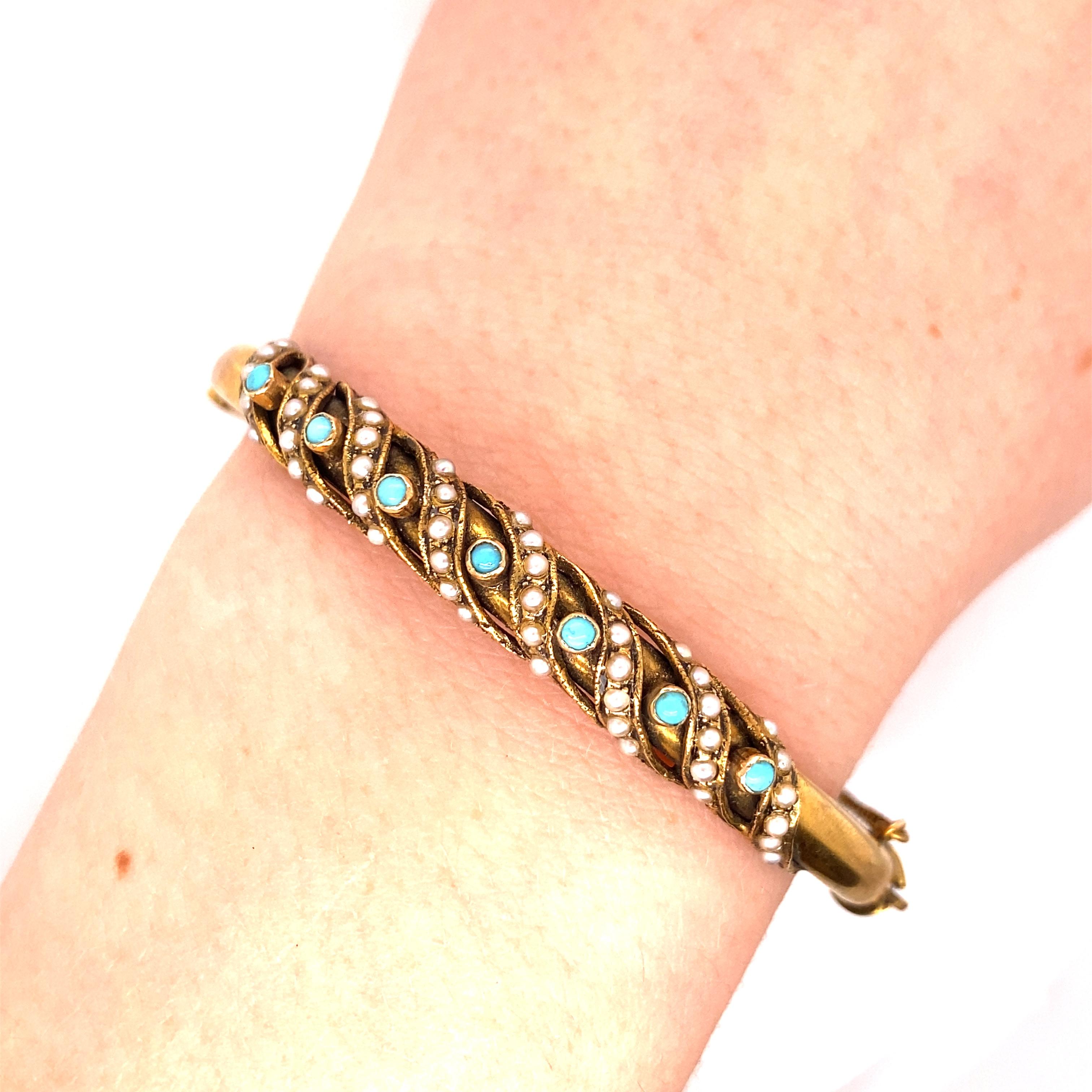 Vintage 1970's 14K Yellow Gold Bangle Bracelet with Turquoise and Seed Pearls - The bangle contains 7 small turquoise stones and 8 ribbons of seed pearls - 6 pearls in each. The bracelet's width is .25 inches. The inside diameter is 2.25 inches high