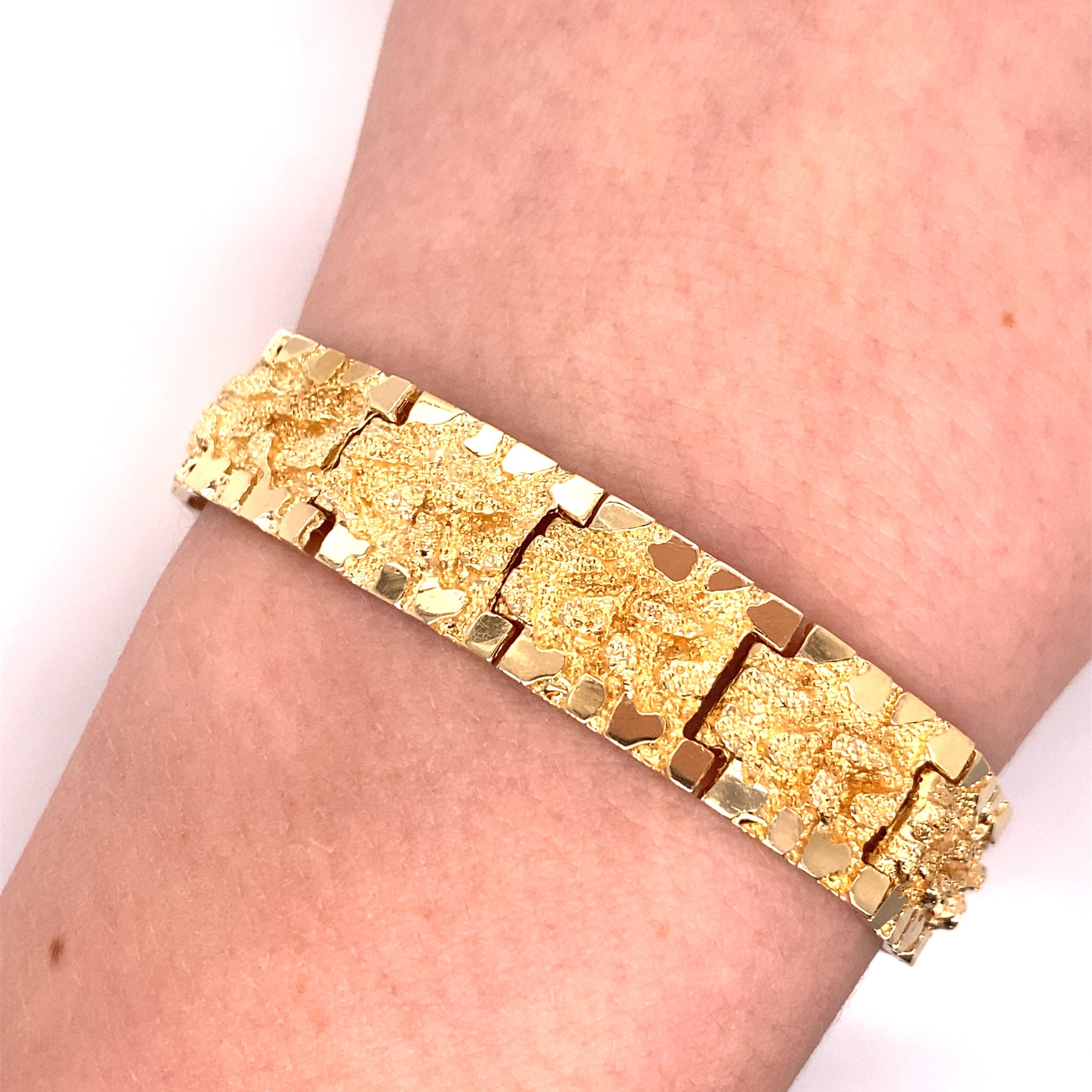 Vintage 1970's 14K Yellow Gold Nugget Bracelet - The bracelet measures .5 inches wide and 7.5inches long (7.75 inch optional length) with a fold over clasp. The bracelet weighs 26.28 grams.