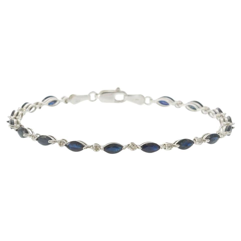 Bracciale vintage anni '70 in oro bianco 14KT con zaffiri blu e diamanti in vendita