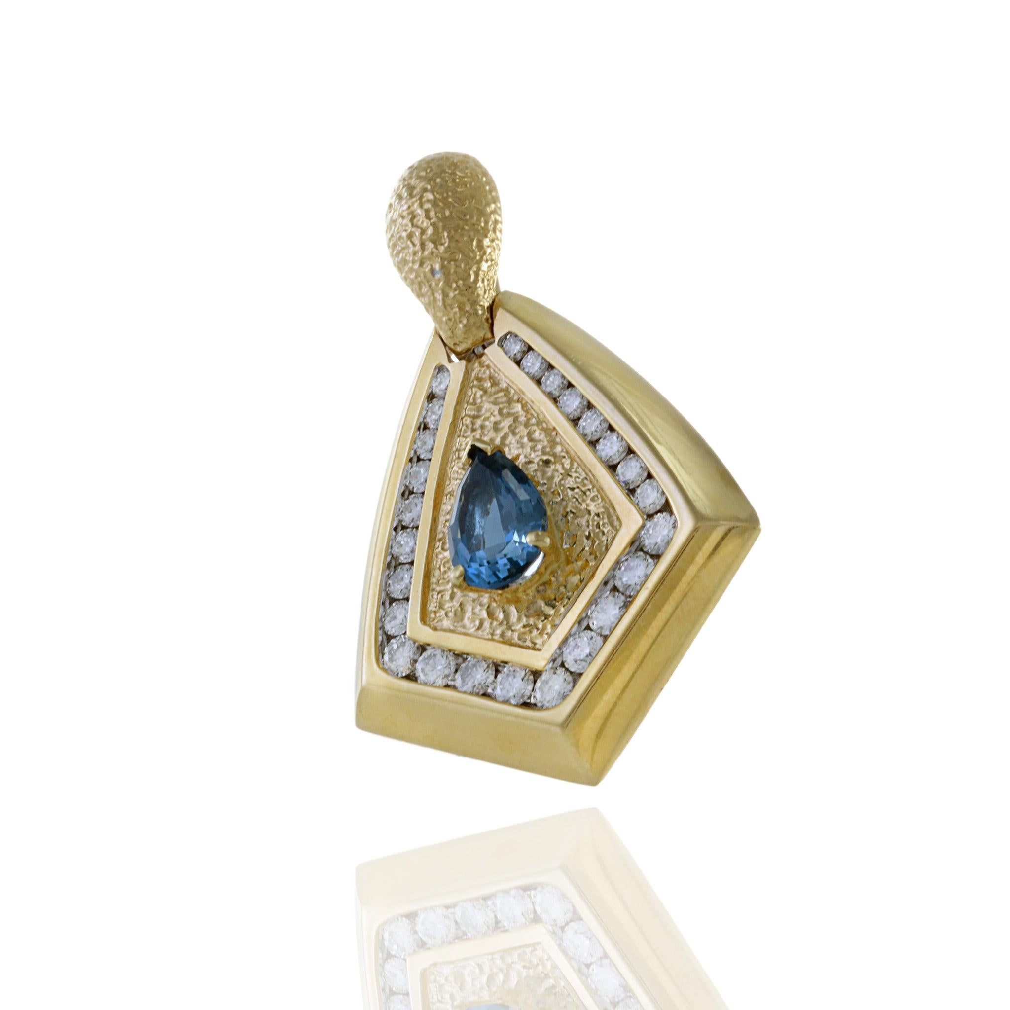 Pear Cut Vintage 1970s 14KT Yellow Gold Diamond And Blue Topaz Pendant