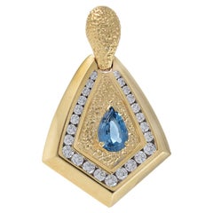 Vintage 1970s 14KT Yellow Gold Diamond And Blue Topaz Pendant