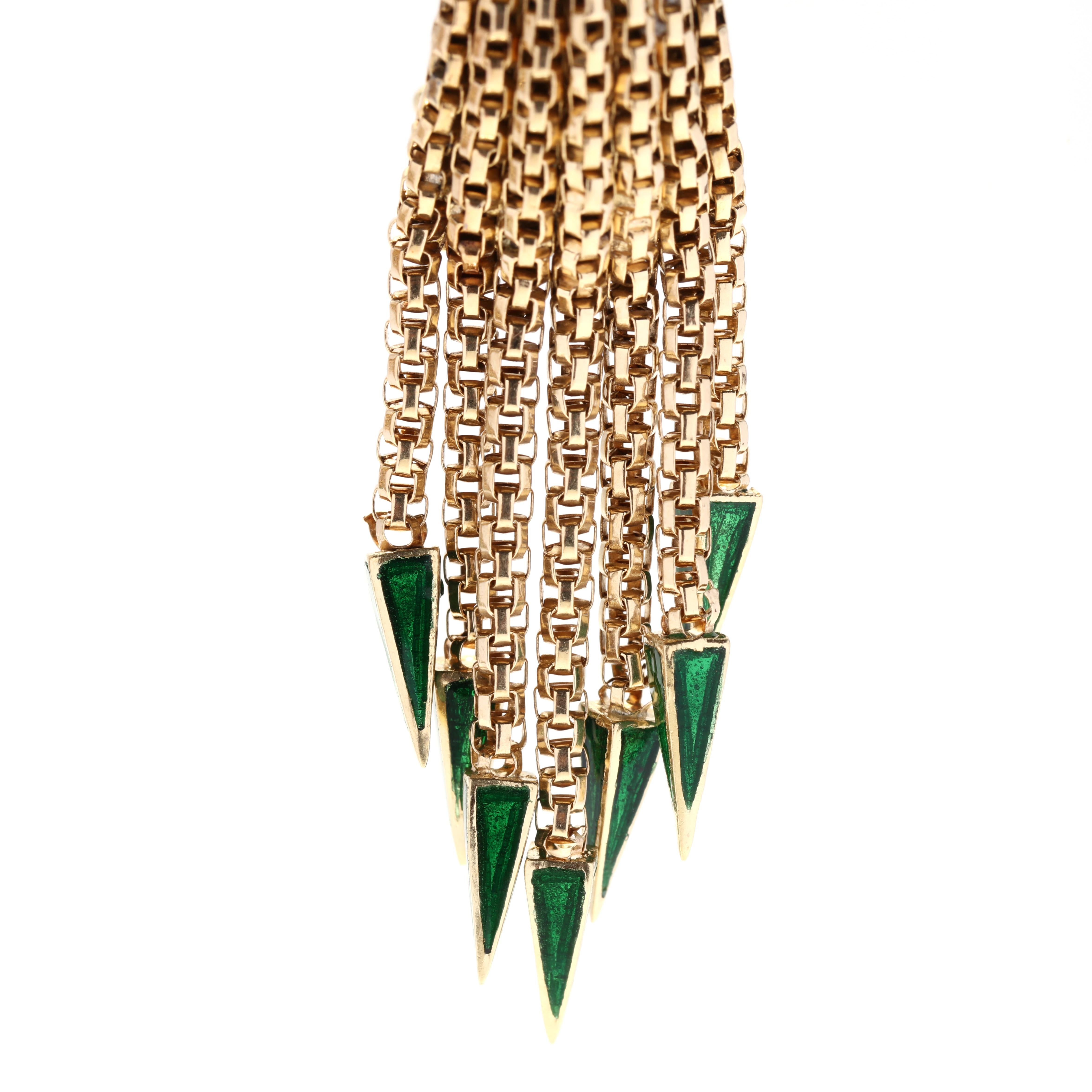 A pair of vintage 1970s 14 karat yellow gold green enamel fringe earrings. These statement earrings feature a cluster of box chain dangles with green enamel pyramidal end caps and with pierced omega backs.

Length: 2.75 in.

Width: 3/8 in.

Weight: