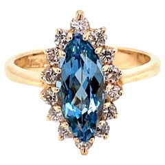 Vintage 1970
s 1.57ct Marquise Cut Aquamarine Ring with Diamonds