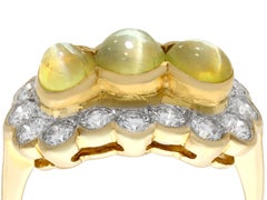 Anello da cocktail in oro vintage anni '70 con taglio cabochon di crisoberillo e diamanti da 2,19 carati