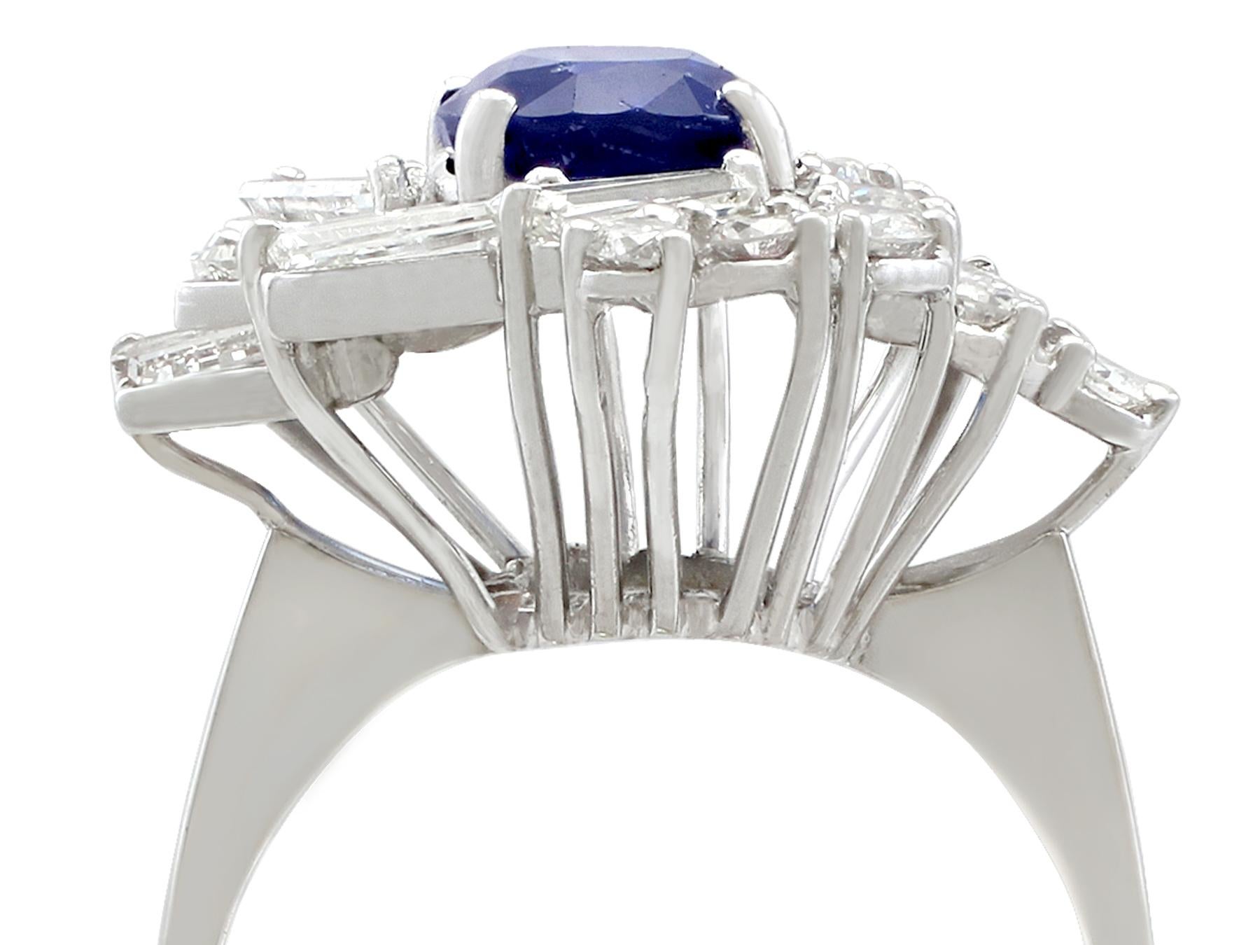 A stunning, fine and impressive 2.45 Carat blue sapphire and 2.23 Carat diamond, 18 karat white gold cluster ring; part of our diverse vintage jewelry collections

This stunning, fine and impressive vintage sapphire and diamond cluster ring has been