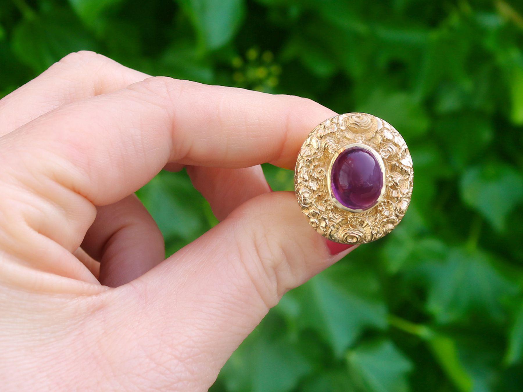 An impressive vintage 3.77 carat amethyst and 9 karat yellow gold cocktail ring; part of our diverse amethyst jewelry and estate jewelry collections.

This fine and impressive vintage amethyst ring has been crafted in 9k yellow gold.

The ring has