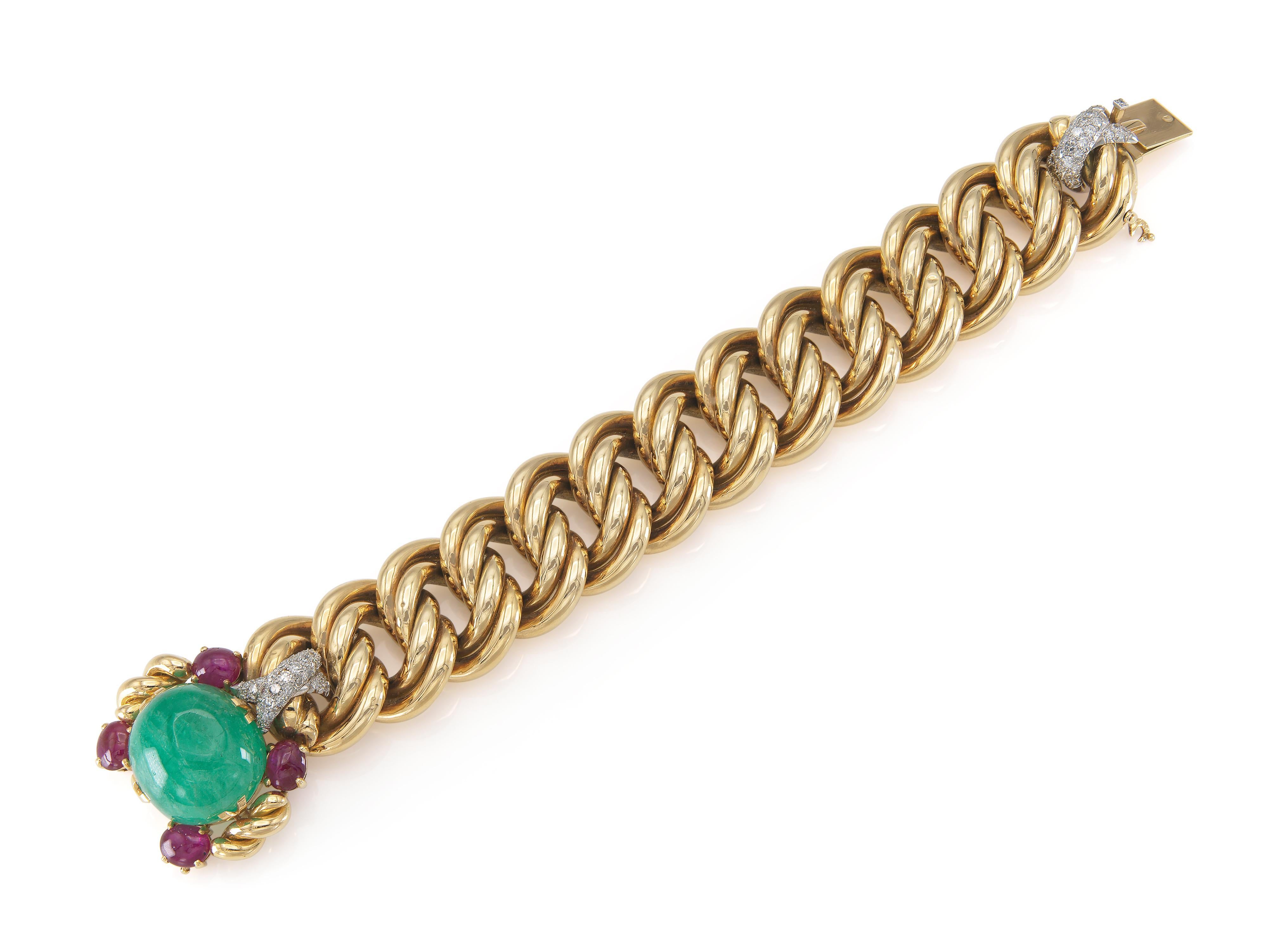 Finely crafted in 18k yellow gold with a Cabochon Emerald weighing 57.80 carats, 4 Cabochon Rubies weighing a total of 9.92 carats, and Round Brilliant cut Diamonds weighing a total of 1.75 carats.
Circa 1970s
Made in France
Size 8 inches