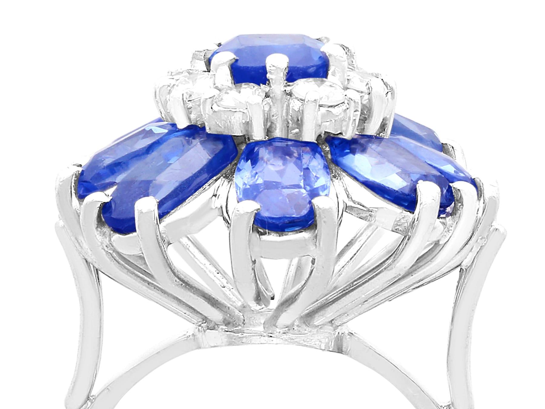 A fine and impressive 7.84 carat blue sapphire and 0.40 carat diamond, 18 karat white gold cocktail ring; part of our diverse vintage jewelry collections.

This fine and impressive vintage sapphire ring has been crafted in 18k white gold.

The