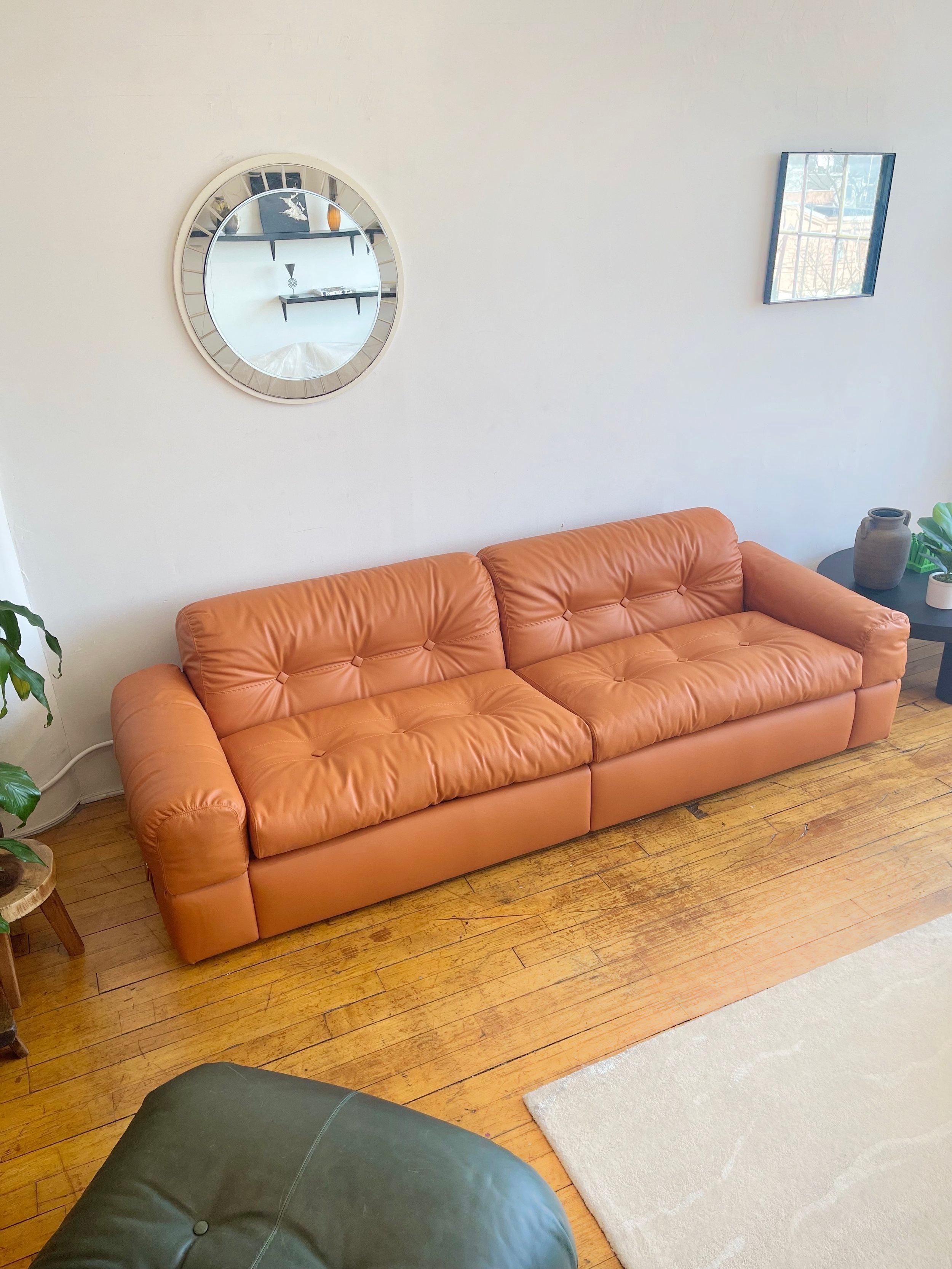 Introducing this stunning vintage Italian Leather Sofa by Adriano Piazzesi, a rare vintage Italian piece that showcases iconic design and timeless appeal. This exceptional vintage leather sofa, sourced from Italy and originating from the 1970s, has