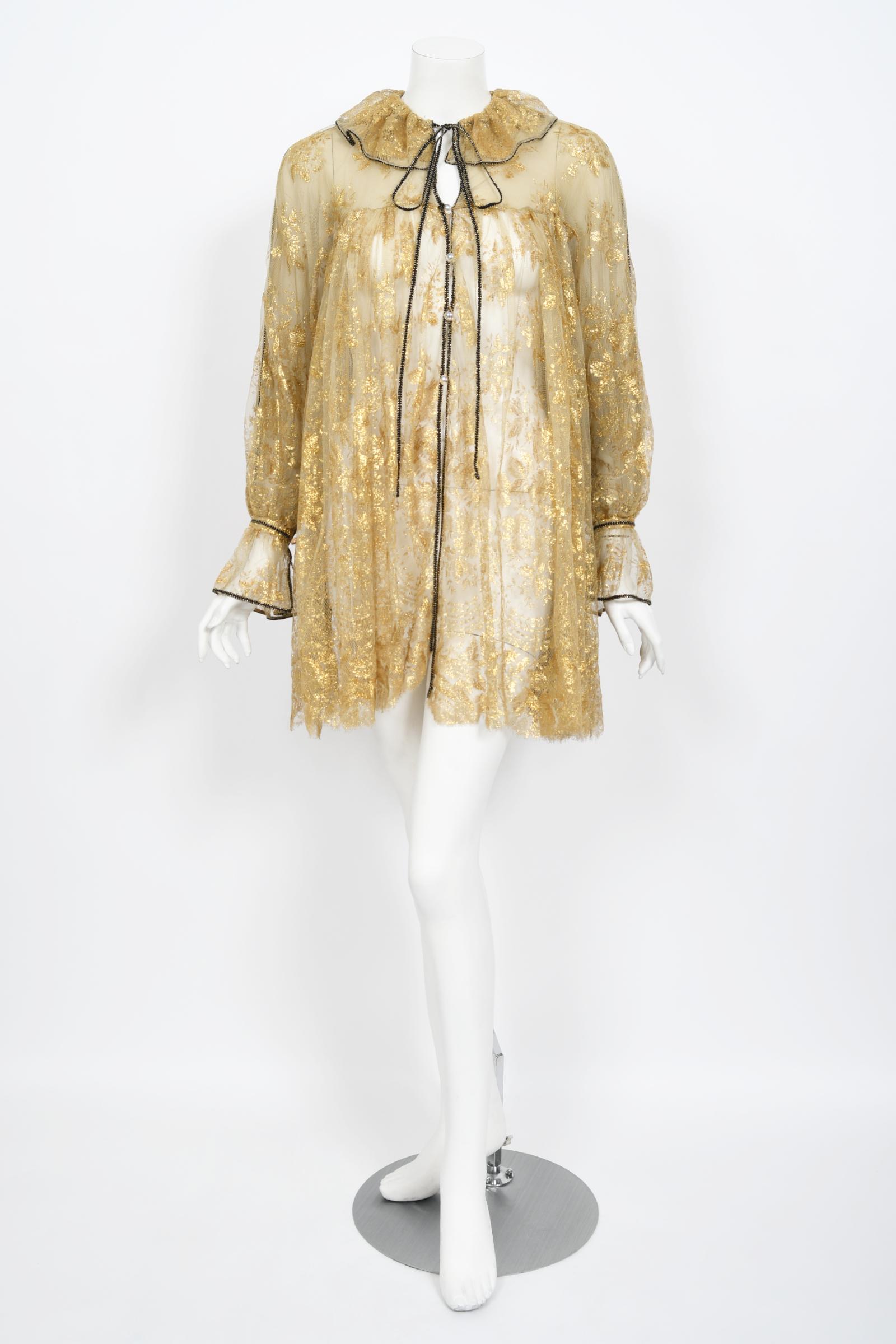 A truly magical and ultra rare Bill Gibb of London couture metallic gold lace tunic babydoll dress dating back to his 1978 fall-winter collection. His pieces are very collectible and found in museum's around the globe. As shown, a very similar