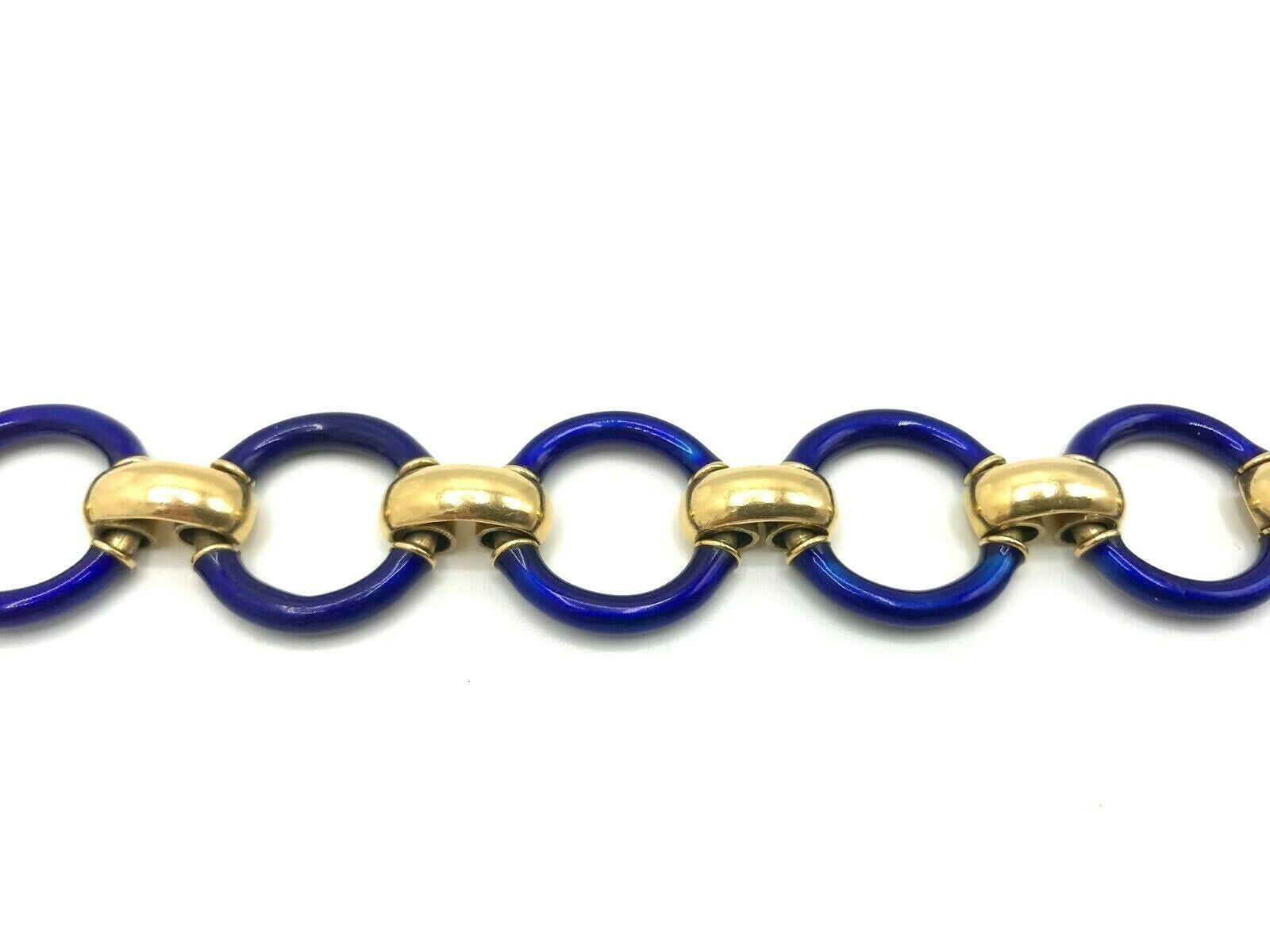 Bright beautiful vintage bracelet made of blue enamel links connected with 18k yellow gold parts. 
Stamped with a hallmark for 18k gold .
Measurements: 7.5