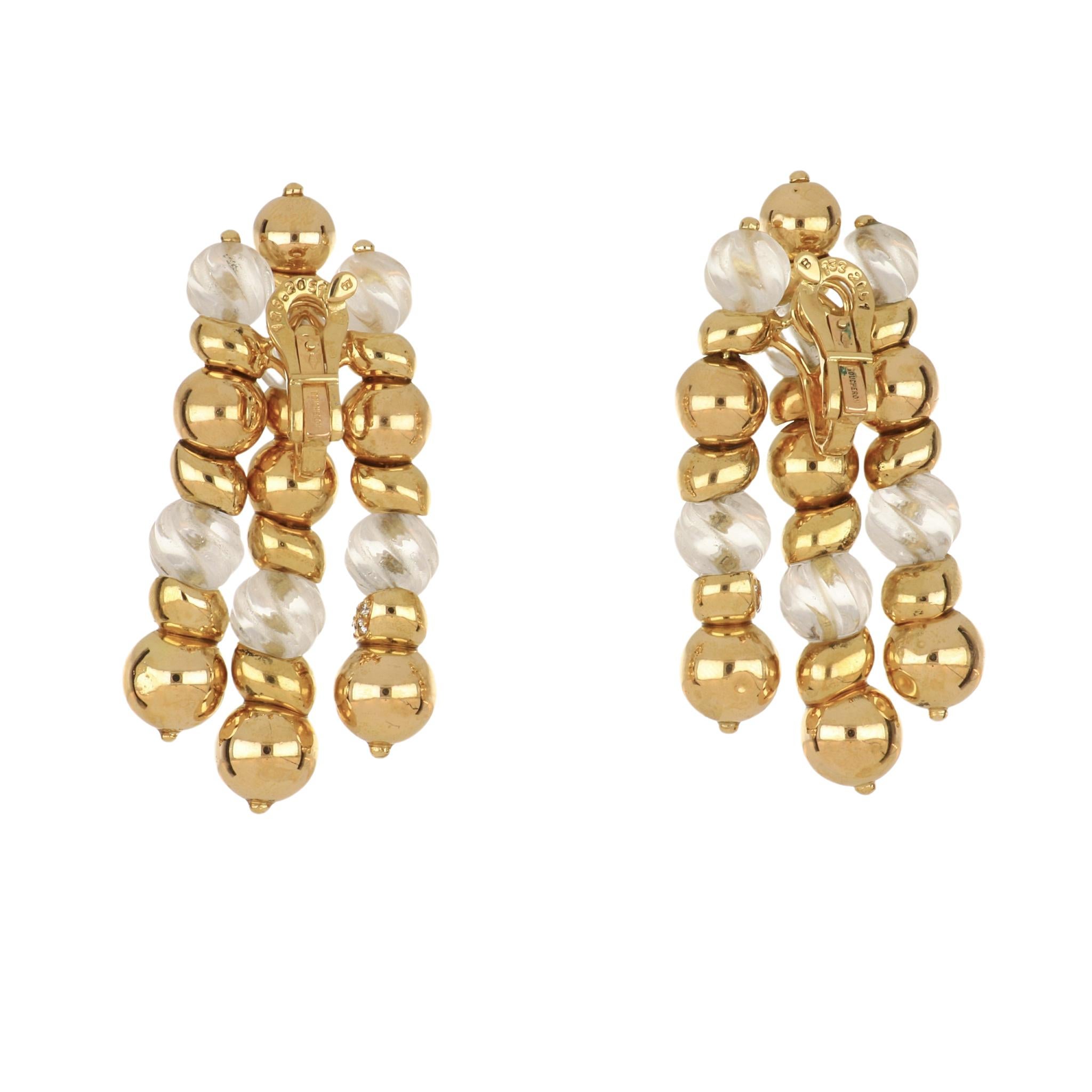 A pair of vintage Boucheron triple tassel earrings with carved rock crystal beads , pavé diamond accents and 18K yellow gold. There are 48 round brilliant-cut diamonds set in gold bead sections totaling 1.10 carats. They measure 2.25 inches in