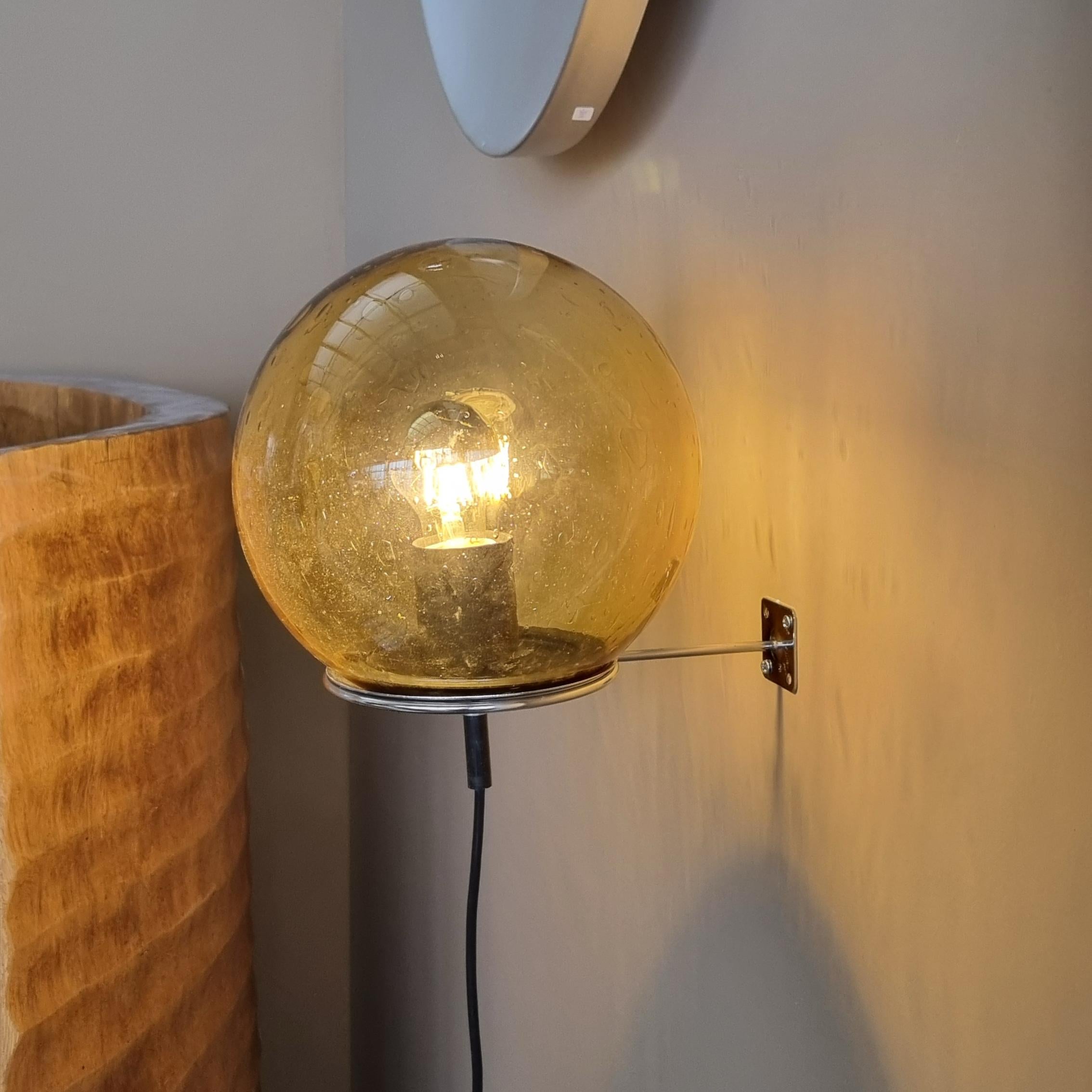 This beautiful vintage pendant lamp, crafted from brown smoke glass, hails from the 1970s and was originally part of a former church interior. Available in two sizes, 25 cm and 30 cm, its timeless design adds a touch of retro elegance to any space.