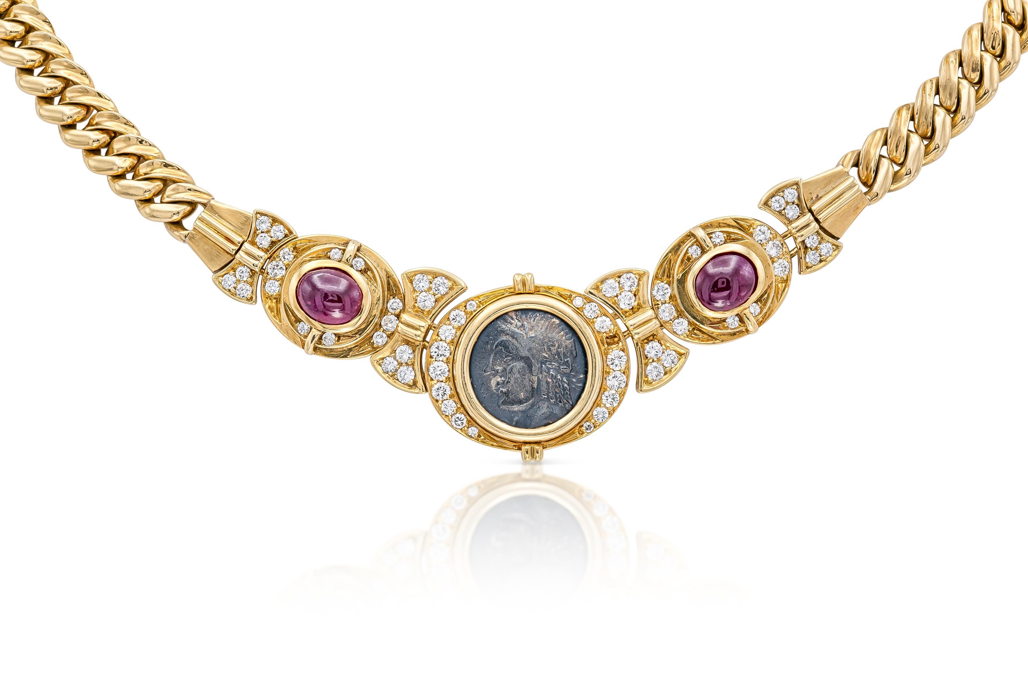 Finely crafted in 18k yellow gold with an ancient Roman coin, two Cabochon Rubies, and Round Brilliant cut Diamonds.
Signed by Bvlgari, from their Monete Collection
Circa 1970s
16 1/2 inches long