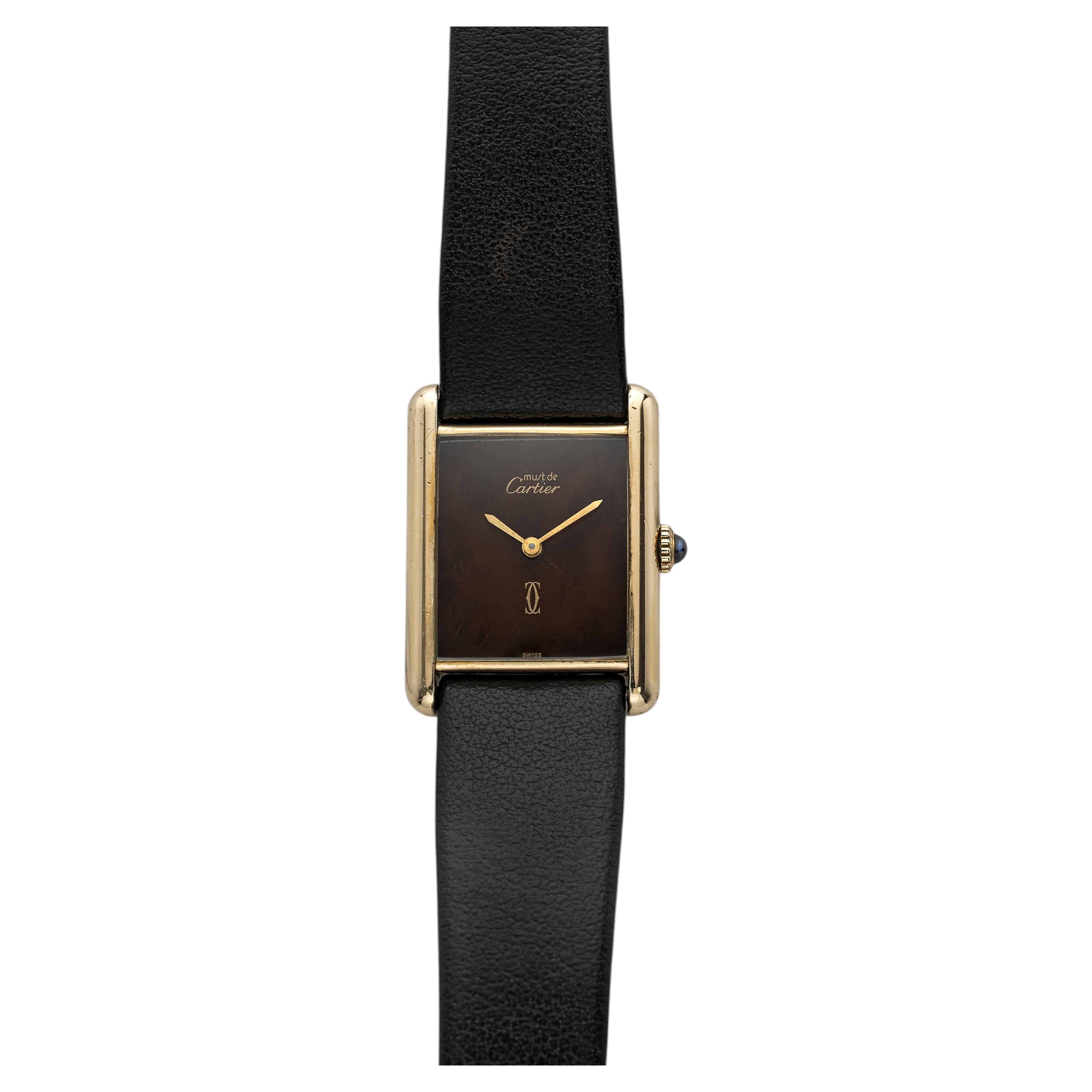 Cartier Must Tank vintage de los años 70, con esmalte dorado (vermeil) y esfera marrón con diseño de carey, cuerda manual, 23 mm