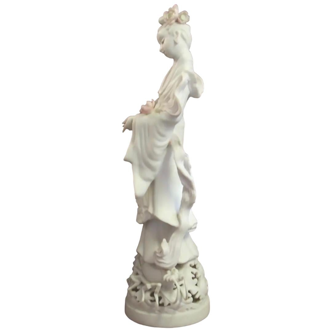This vintage Chinese Kwan Yin porcelain figure  is an exquisite piece for any collector of decorative items.  Crafted by internationally known and desired Cybis Porcelain in 1972; Kwan Yin is the Chinese goddess of mercy and compassion This figure