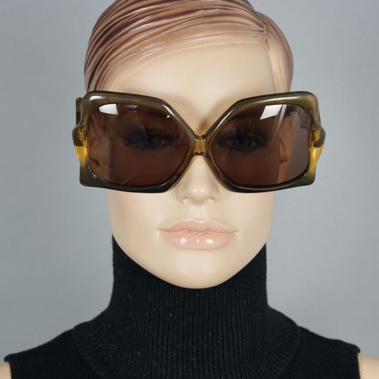 Vintage 1970s CHRISTIAN DIOR Oversized Butterfly Space Age Sunglasses

Measurements:
Height: 2.75 inches (7 cm)
Horizontal Width: 6.45 inches  (16.5 cm)
Arms: 4.92 inches  (12.5 cm)

Features:
- 100% Authentic CHRISTIAN DIOR. 
- Dramatic oversized