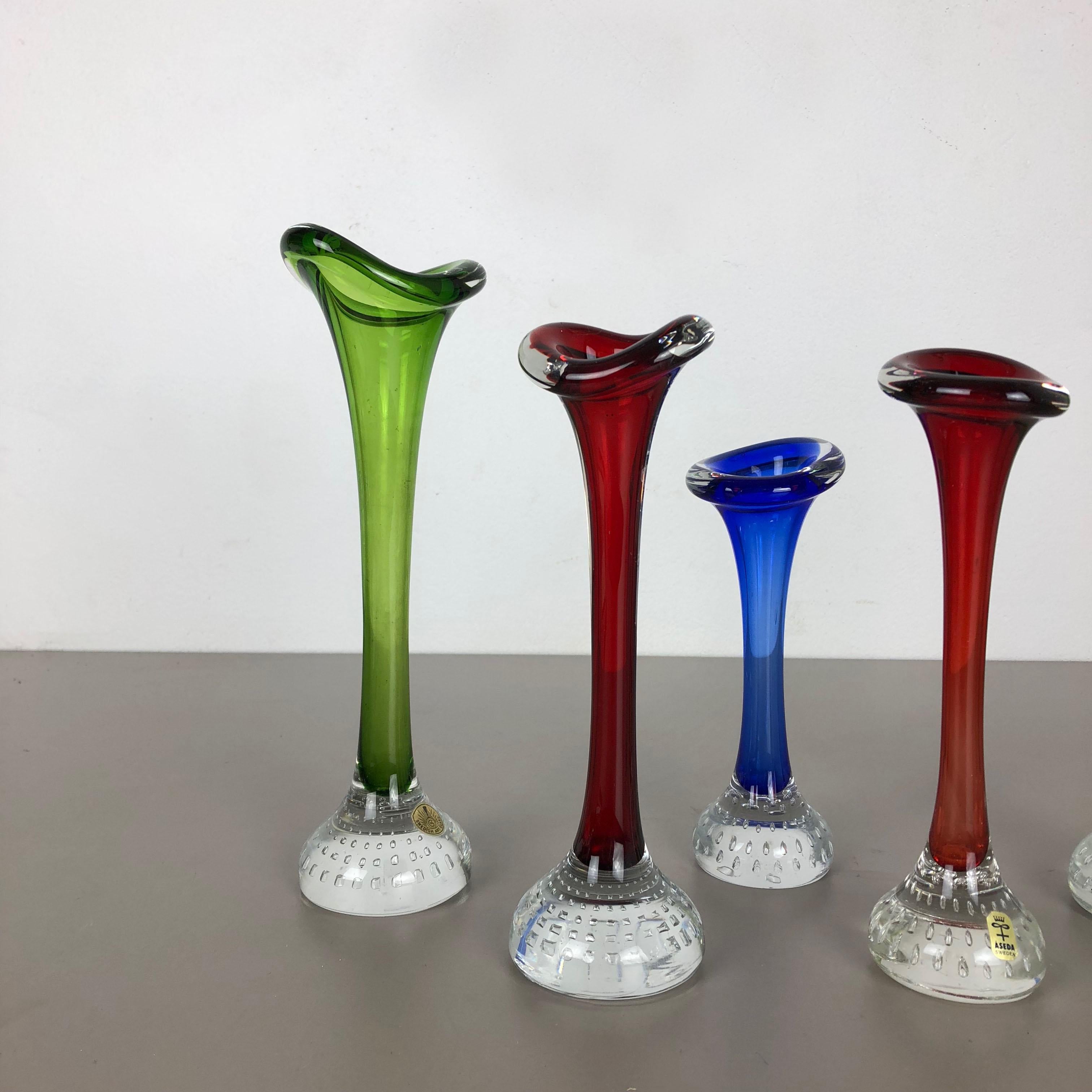 Article:

Set of 5 glass vases


Producer:

ASEDA, Sweden


Design:

Bo Borgstrom 



Decade:

1970s


Original vintage 1970s set of 5 vases of the ASEDA Tulip Series. These five vase are designed by Bo Bergstrom and produced by