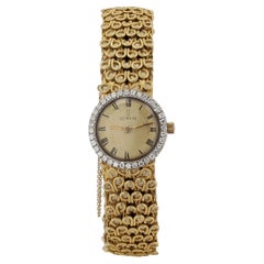 Reloj de cóctel vintage Corum de oro de 18 quilates para señora con diamantes de los años 70