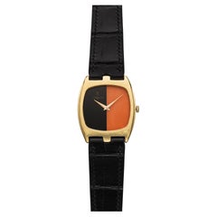 Vintage 1970s Corum 55522 18K Yellow Gold Manual Wind Onyx and Coral Dial 30x34m