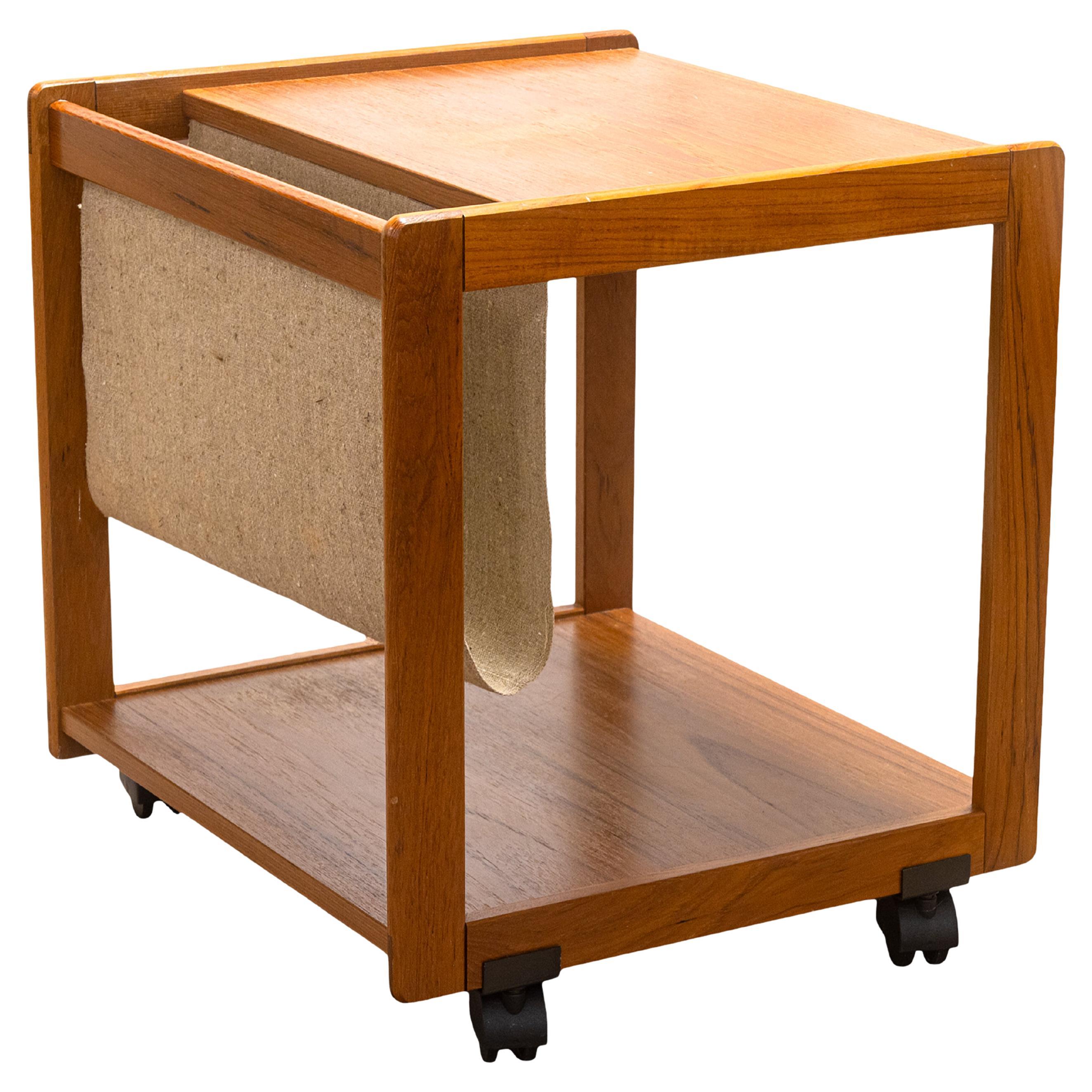 Vintage 1970s Danish FBJ Mobler Teak Side Table w Fabric Magazine Rack & Casters For Sale