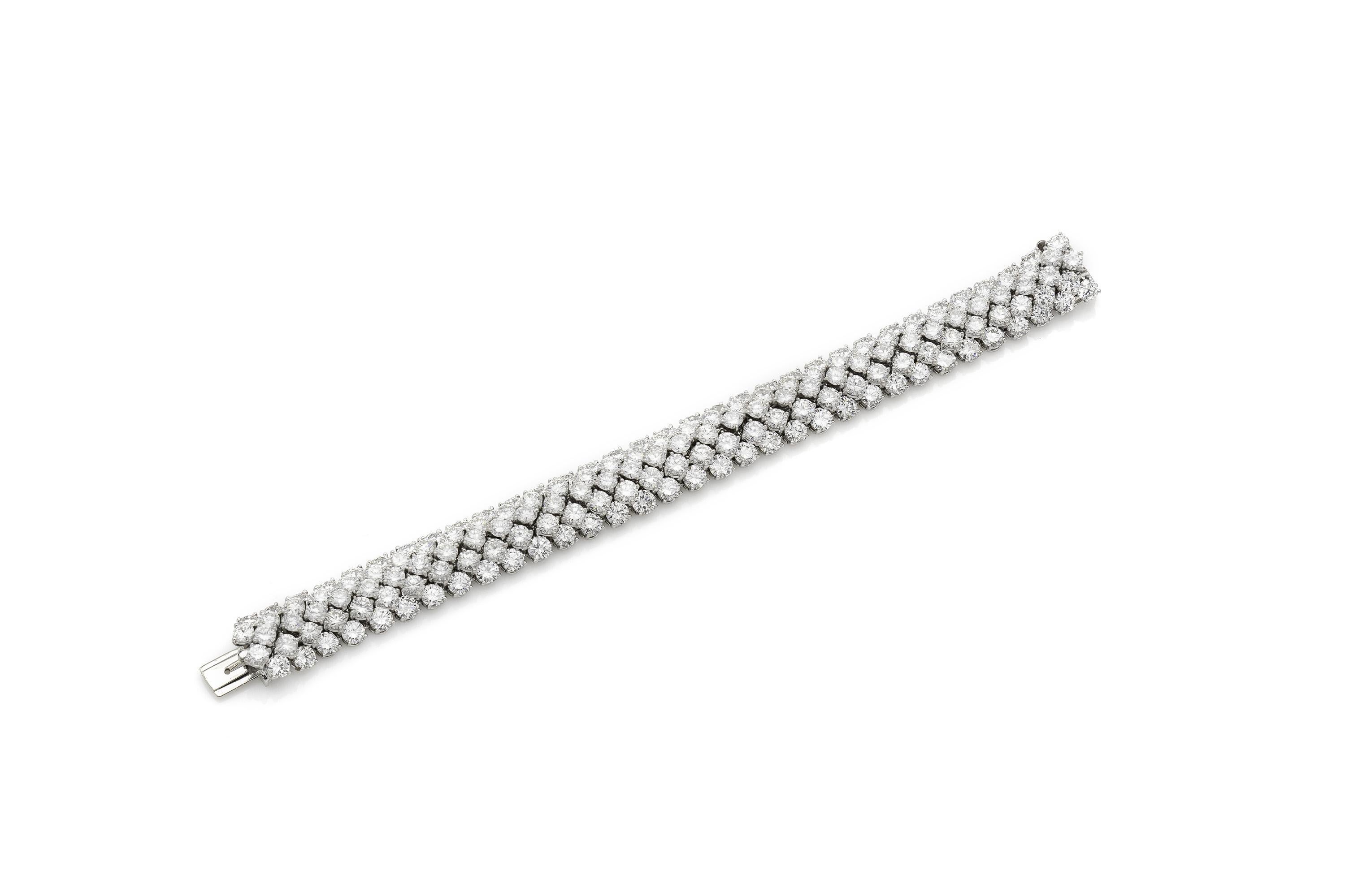 Finely crafted in platinum with Round Brilliant cut Diamonds weighing a total of approximately 33.80 carats.
Signed by David Webb
Circa 1970s
Size 6 3/4 inches
Comes with its Certificate of Authenticity.