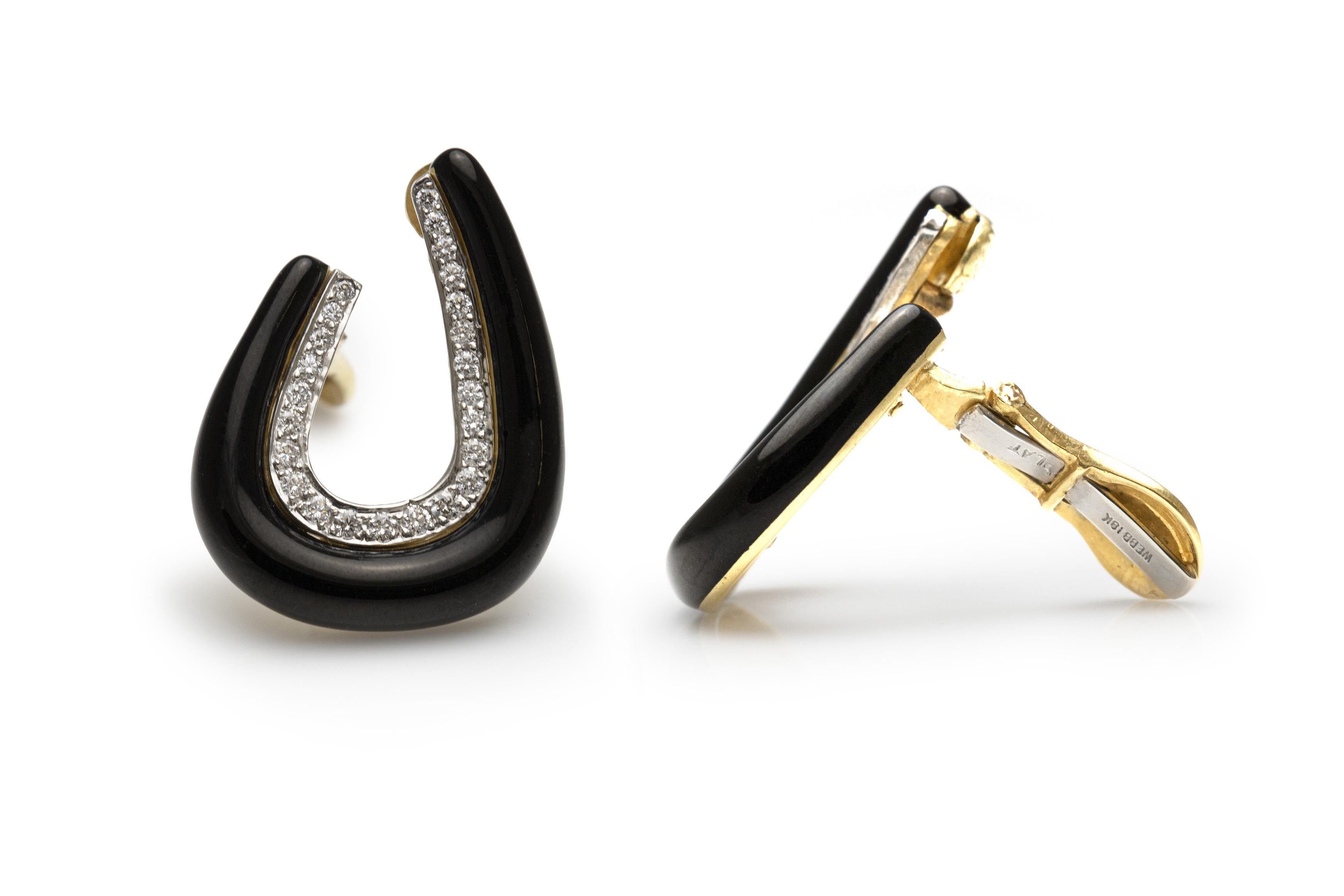 Finely crafted in 18k yellow gold, platinum and black enamel with Round Brilliant cut Diamonds.
Signed by David Webb
Circa 1970s
1 1/4 x 7/8 inches