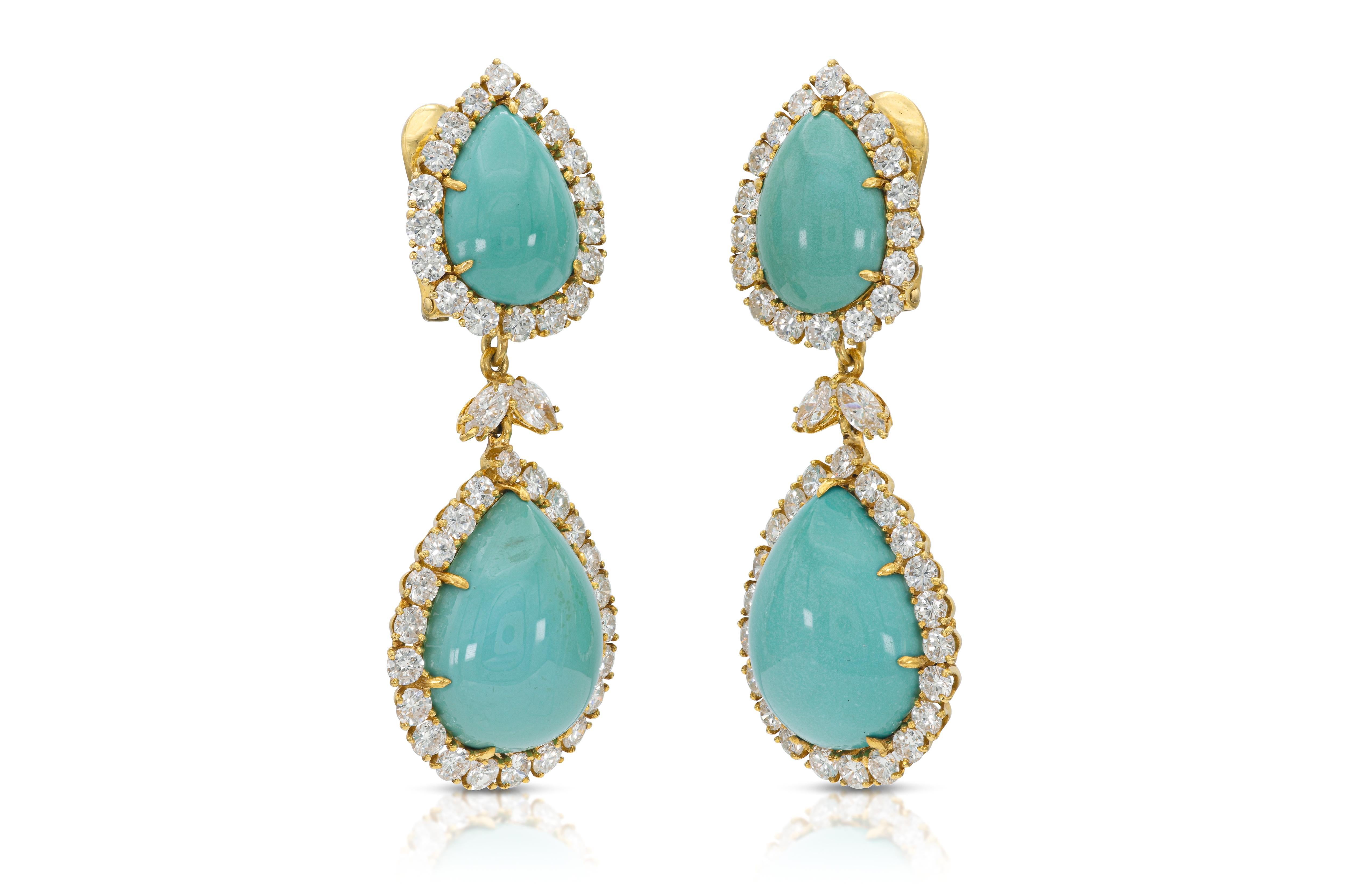 Finely crafted in 18k yellow gold with four Pear-Shaped Cabochon Turquoises and Round Brilliant and Marquise cut Diamonds weighing approximately a total of 10.00 carats.
Signed by David Webb
Circa 1970s
1 1/4 x 7/8 inches
The dangles are detachable.
