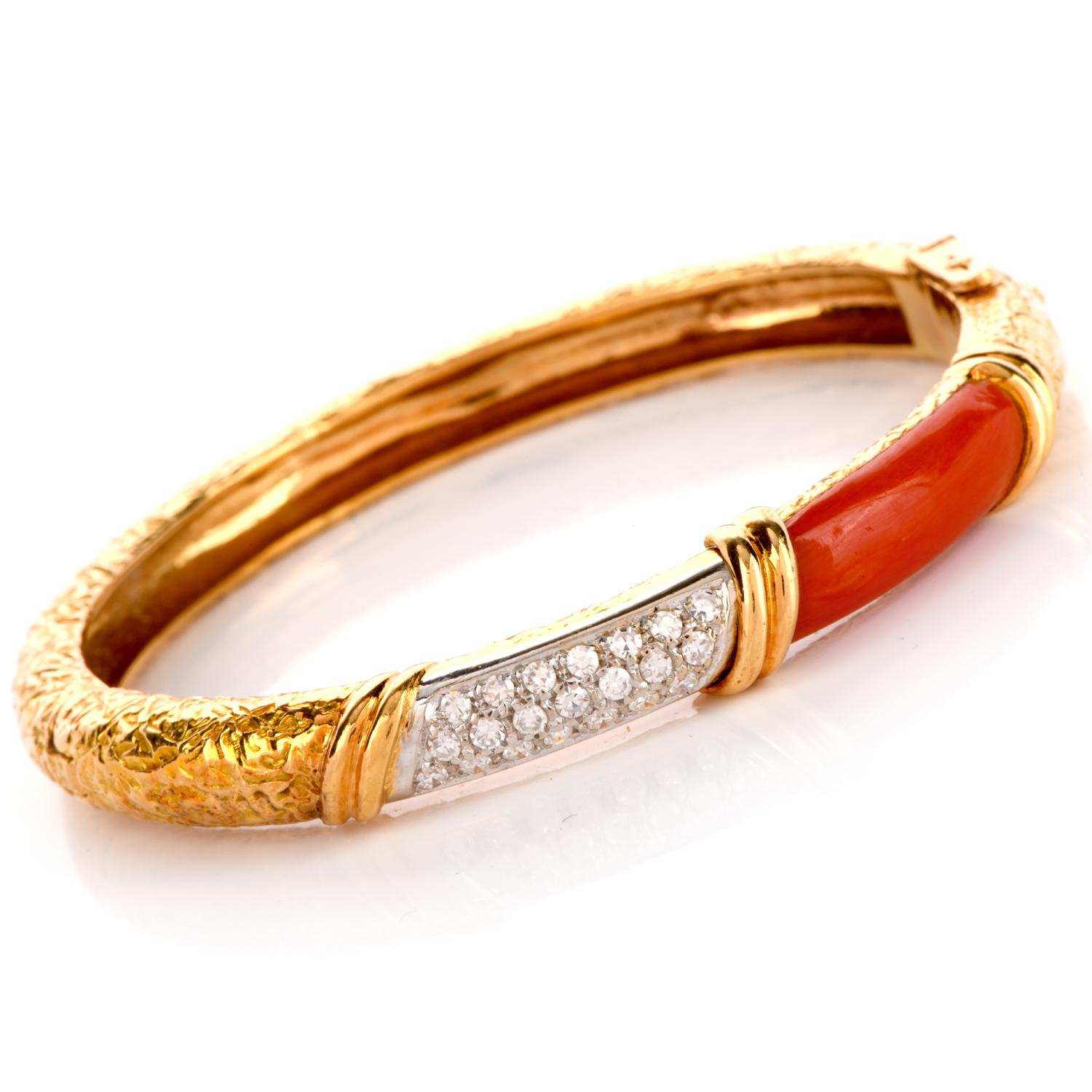 This Vintage 1970's bracelet created in 18k yellow gold,.

This chic bangle is very Feminine and set with 21 incredible round diamonds,

F-G  Color and VVS -VS Clarity and genuine Red Salmon Natural Coral.

Measurement: 7 inches x 7mm wide and 5 mm