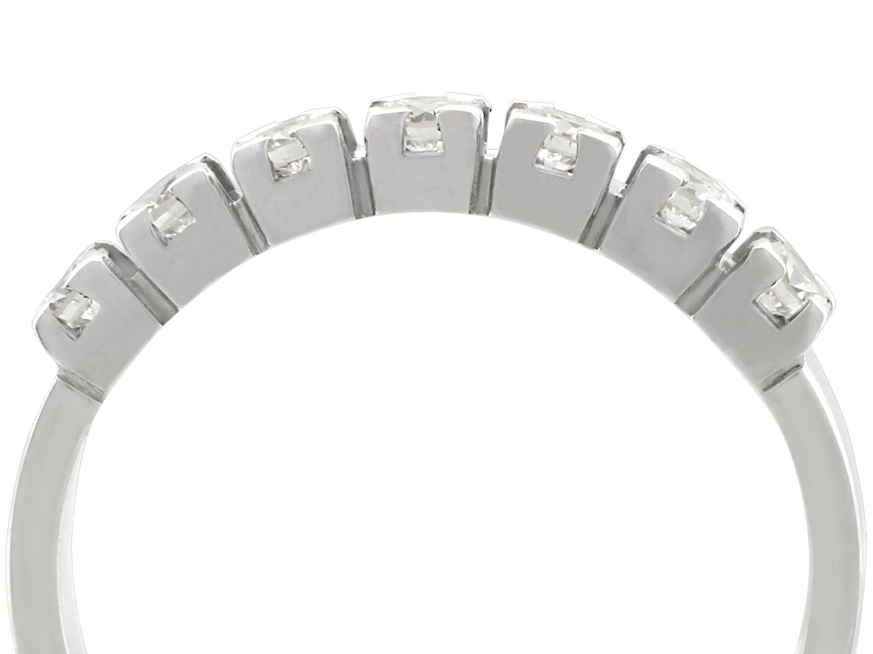 A fine and impressive 0.75 carat diamond and 18 karat white gold half eternity ring; part of our diverse vintage jewelry and estate jewelry collections.

This fine and impressive seven stone diamond half eternity ring has been crafted in 18k white