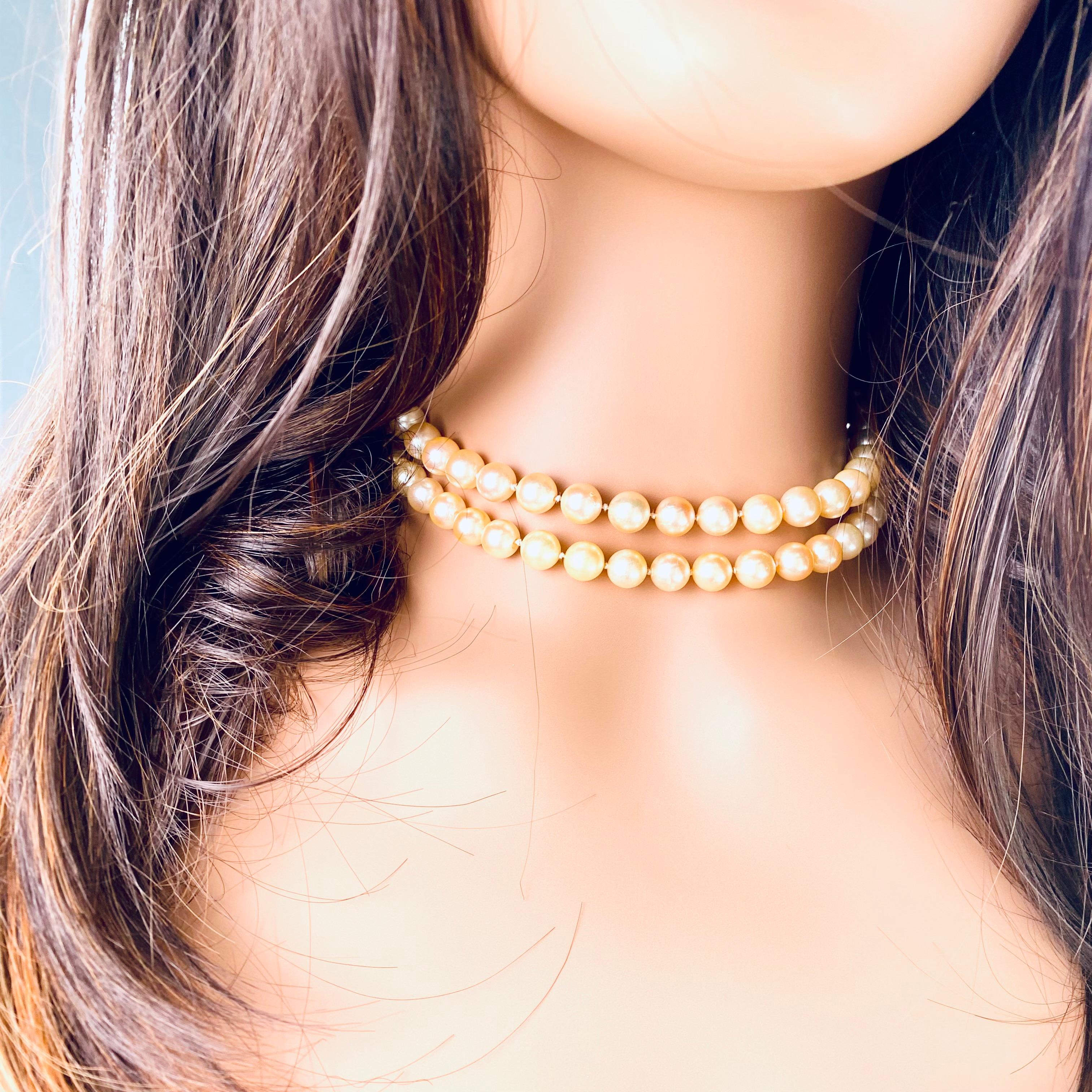 Vintage 1970s Double Strand Cultured Pearl 30 inch Long 14k Gold Clasp Necklace For Sale 3