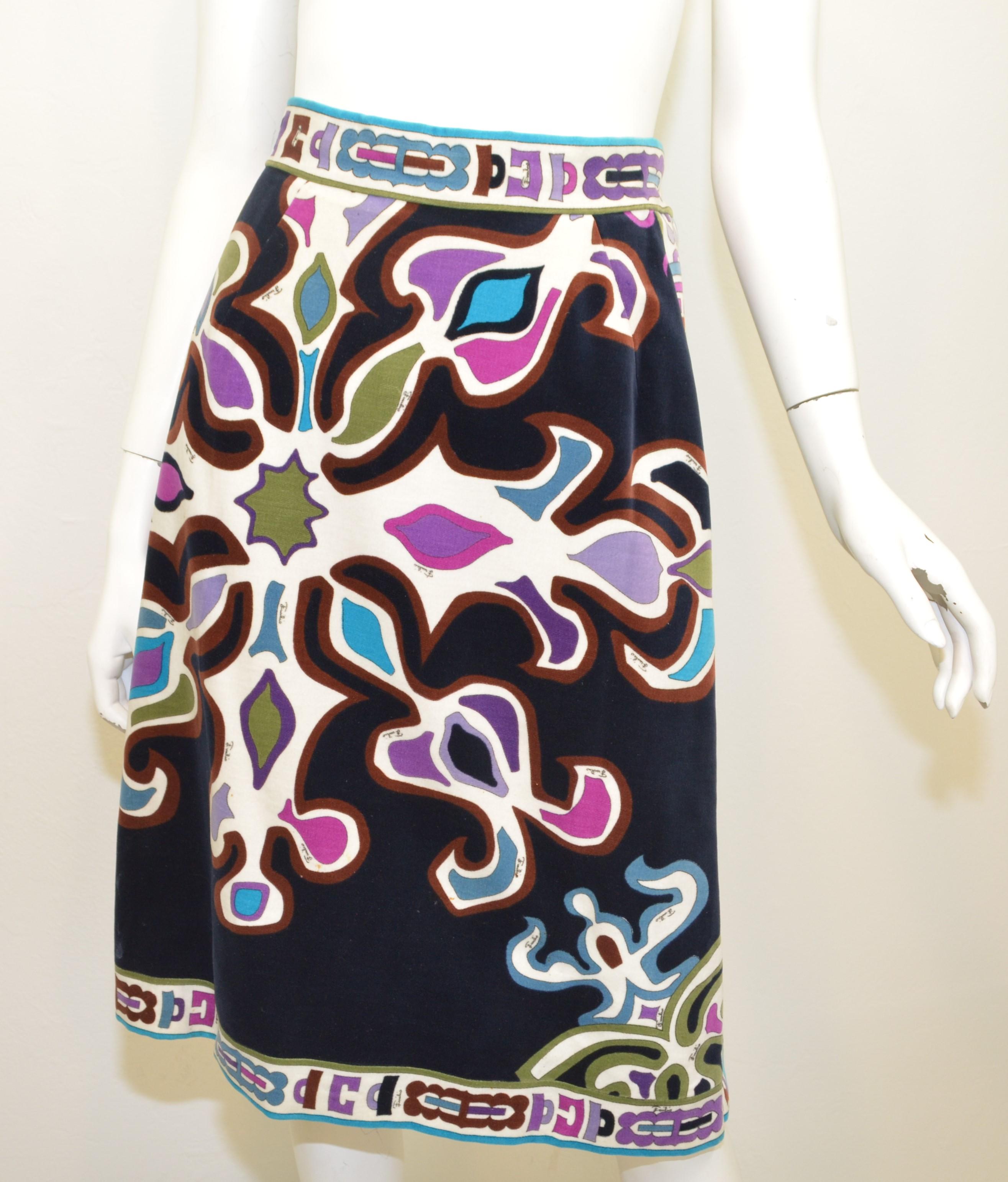 Beautiful Emilio Pucci vintage skirt is featured in an assortment of vibrant colors composed with velvet fabric throughout. Skirt has a back zipper and hook-and-eye fastening and is fully lined. Skirt is in great vintage condition with the exception