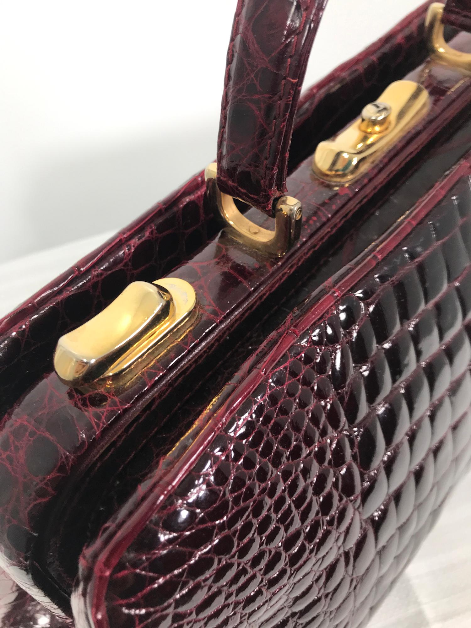 Women's or Men's Vintage 1970s Glazed Burgundy Alligator Satchel with Gold Hardware