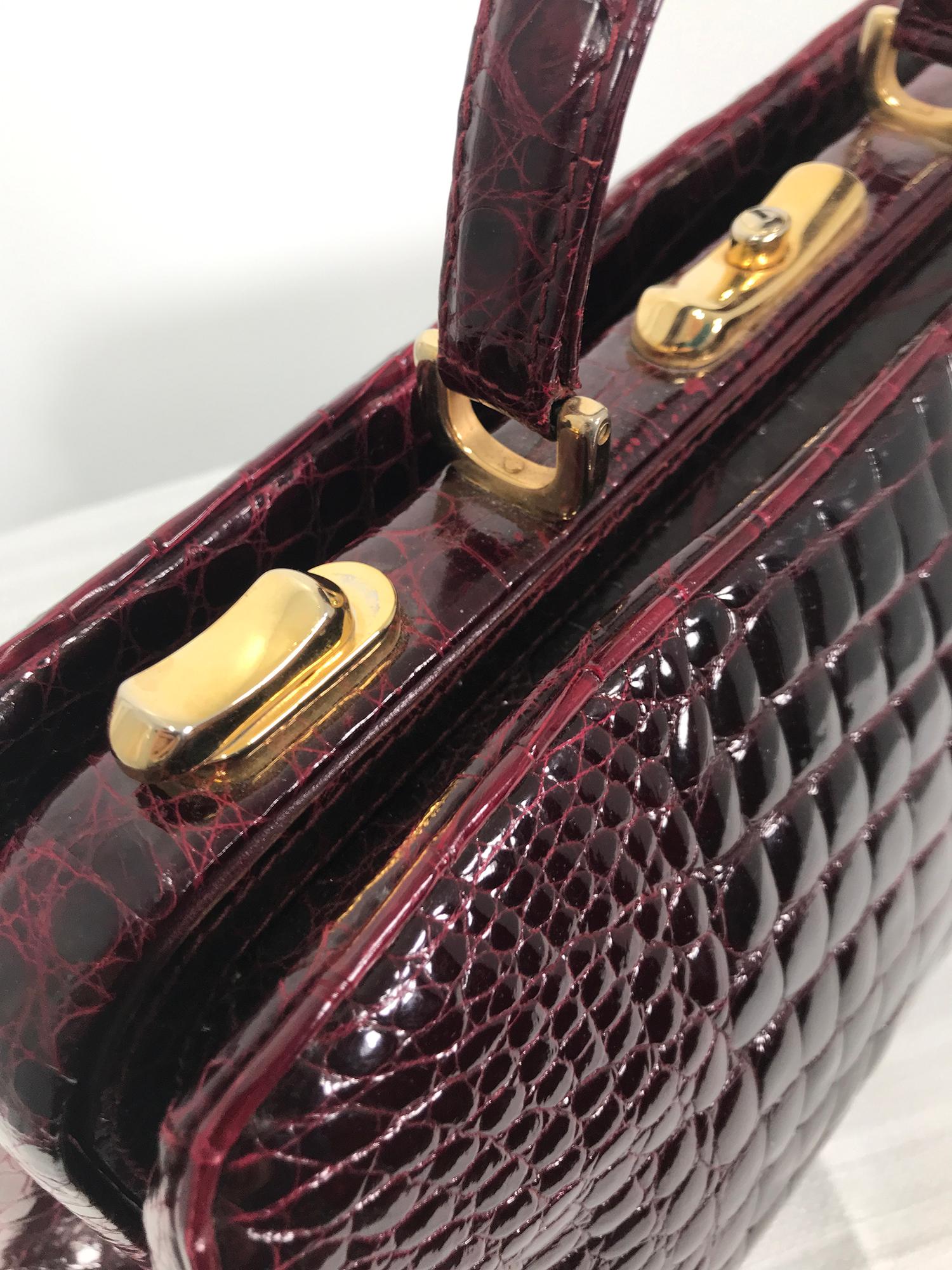 Women's or Men's Vintage 1970s Glazed Burgundy Alligator Satchel with Gold Hardware 