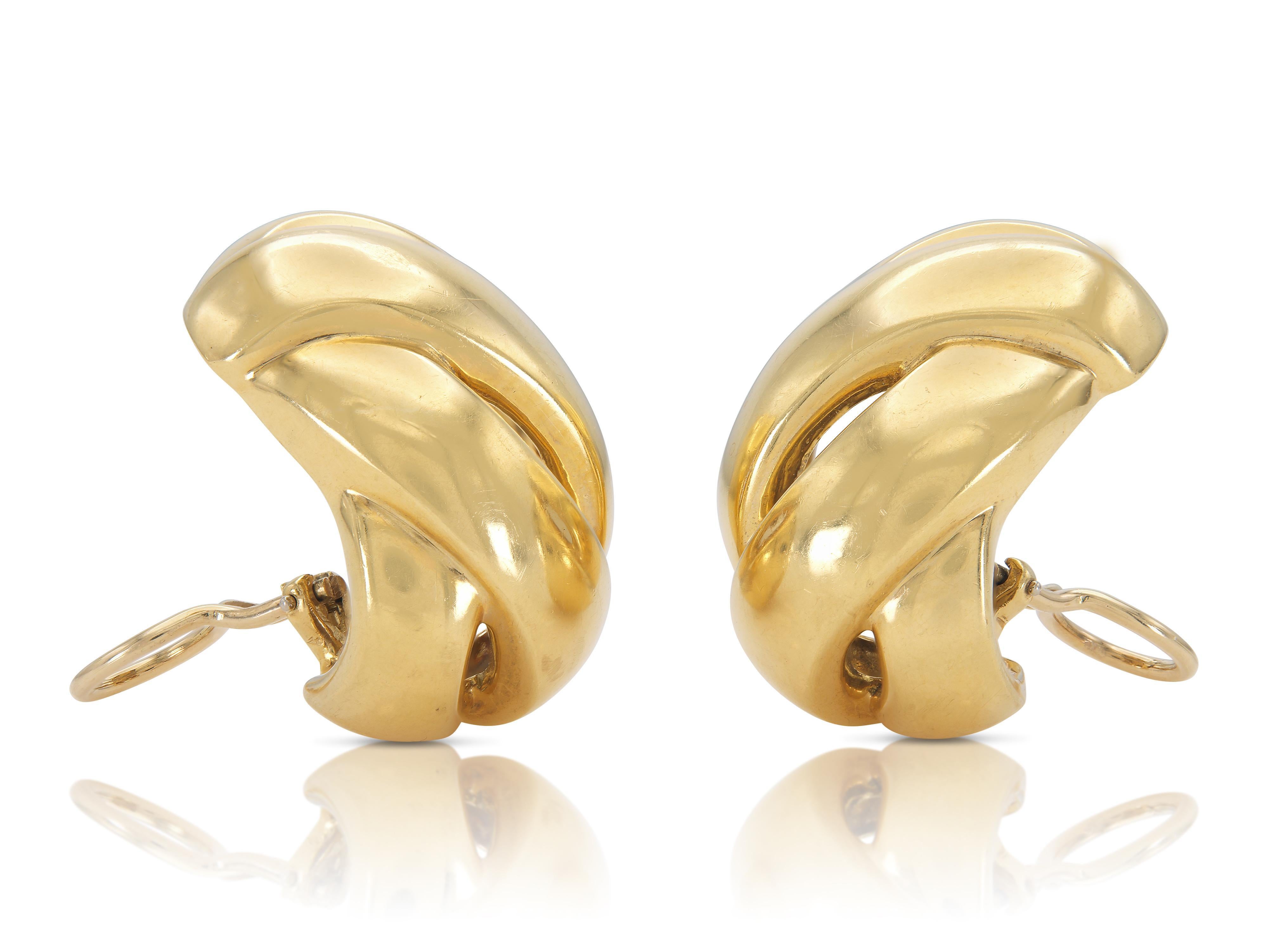 Finely crafted in 18k yellow gold.
Circa 1970s
1 1/2 inches length x 7/8 inch width
