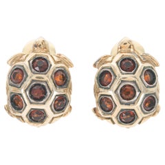 Boucles d
oreilles tortue en or et grenat Vintage 1970