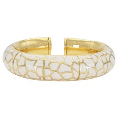 Brazalete vintage de oro y esmalte blanco de los años 70