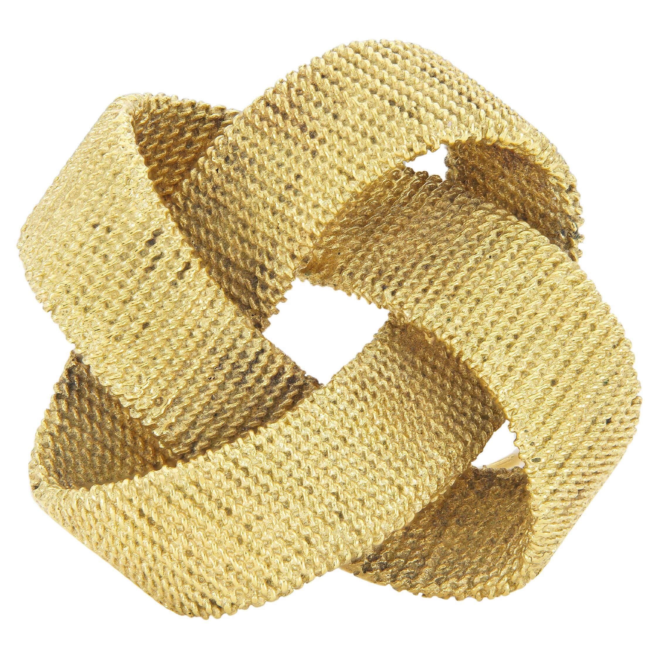 Broche de nudo de oro vintage de los años 70