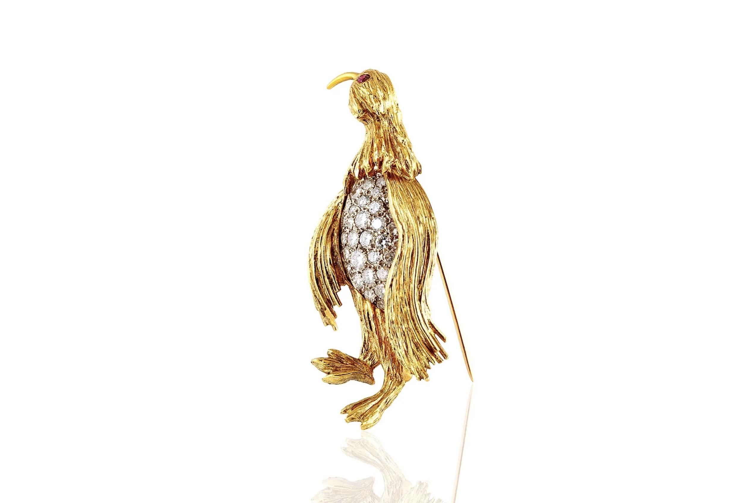 Finely crafted in 18k yellow gold with Round Brilliant cut Diamonds weighing approximately a total of 1.40 carats and a Round cut Ruby for the eye.
Circa 1970s
2 inches x 1 inch