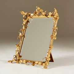 Vintage 1970s gold table mirror with decorative foliage leaf frame