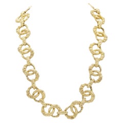 Vintage 1970s Gold Textured Circle Link Necklace (Collier à maillons circulaires texturés en or)