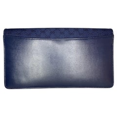 Vintage 1970s Gucci Navy Blue Micro GG Monogram Clutch with Web Stripe