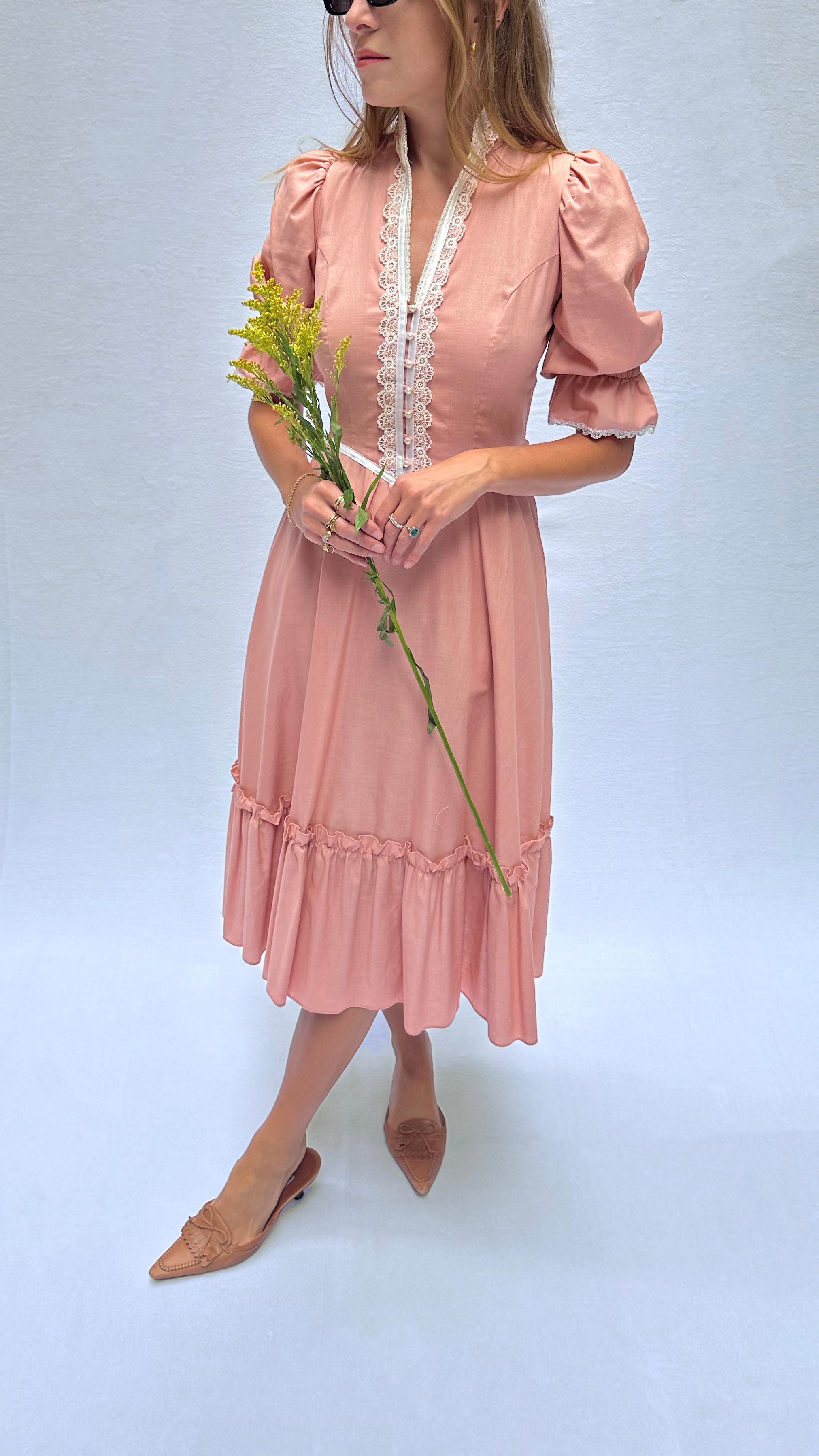 The vintage Gunne Sax dress you've been dreaming of: in the 1970s, Gunne Sax borrowed heavily from Victorian silhouettes, igniting an entire aesthetic that went on to define the style of an era. I especially love the fitted princess-seamed Victorian